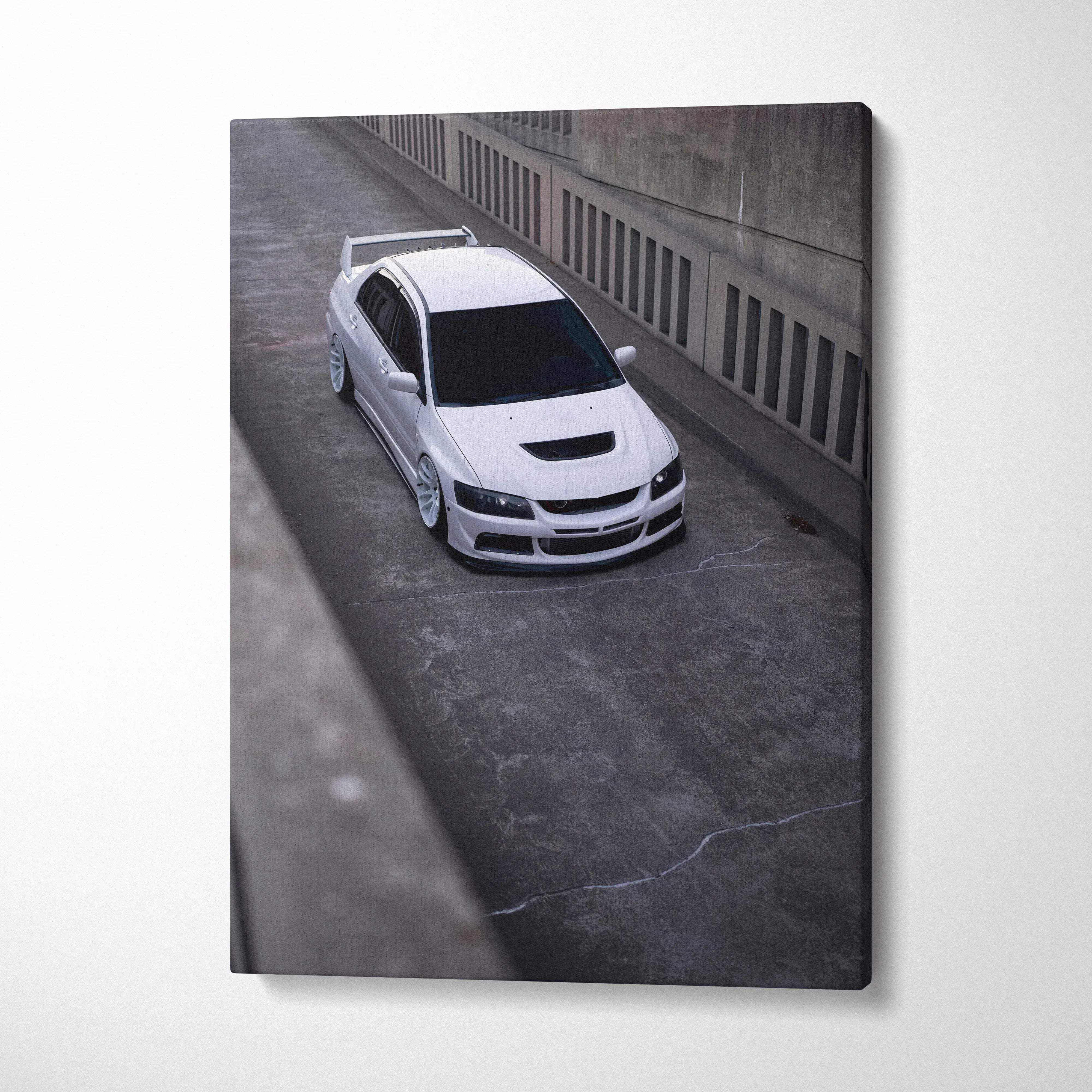 Vertical canvas art featuring a high-resolution white Mitsubishi Evo 8 car in an urban setting, museum-quality wall art.