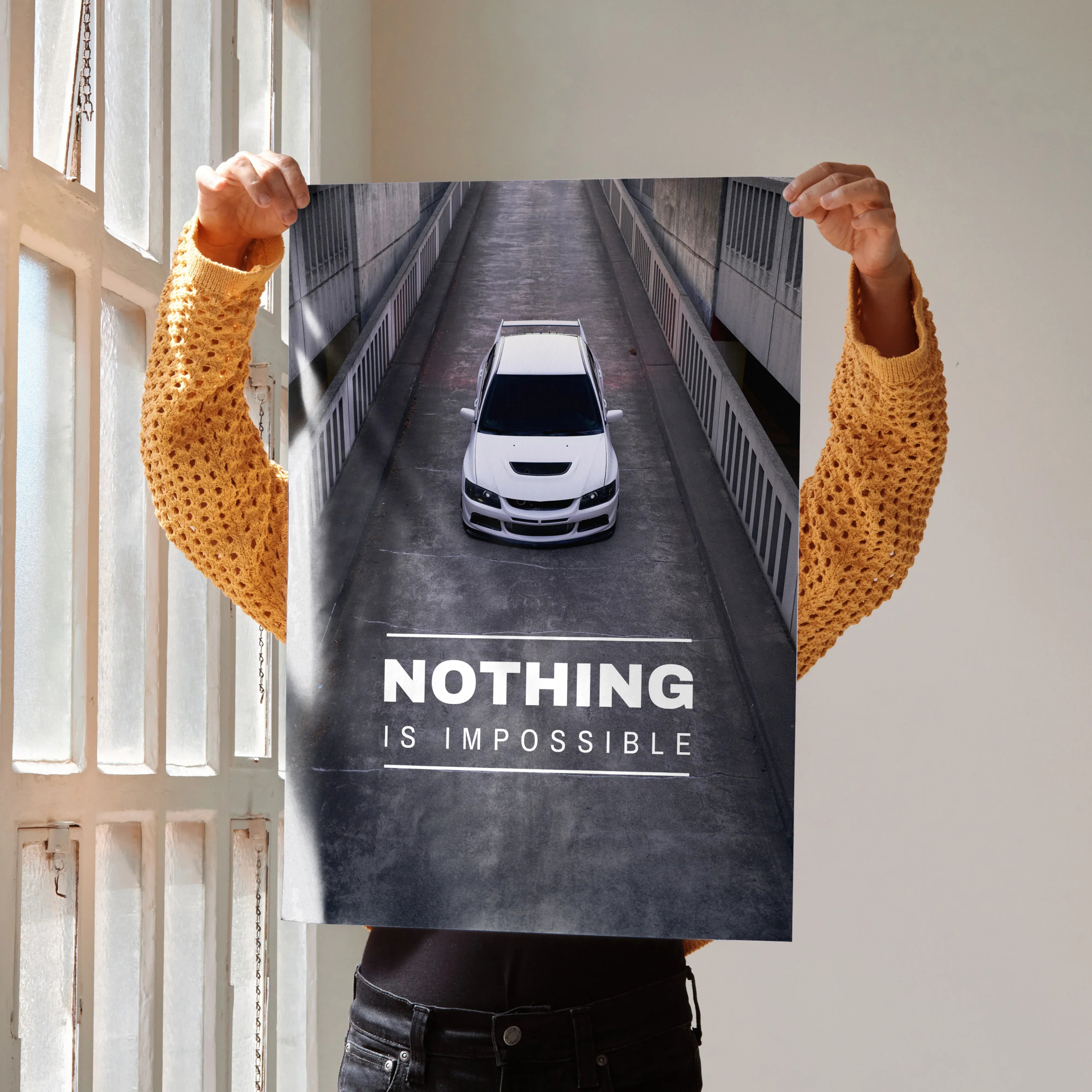 Motivational poster wall art featuring white Mitsubishi Evo 8 with "Nothing is impossible" text in bold white letters.