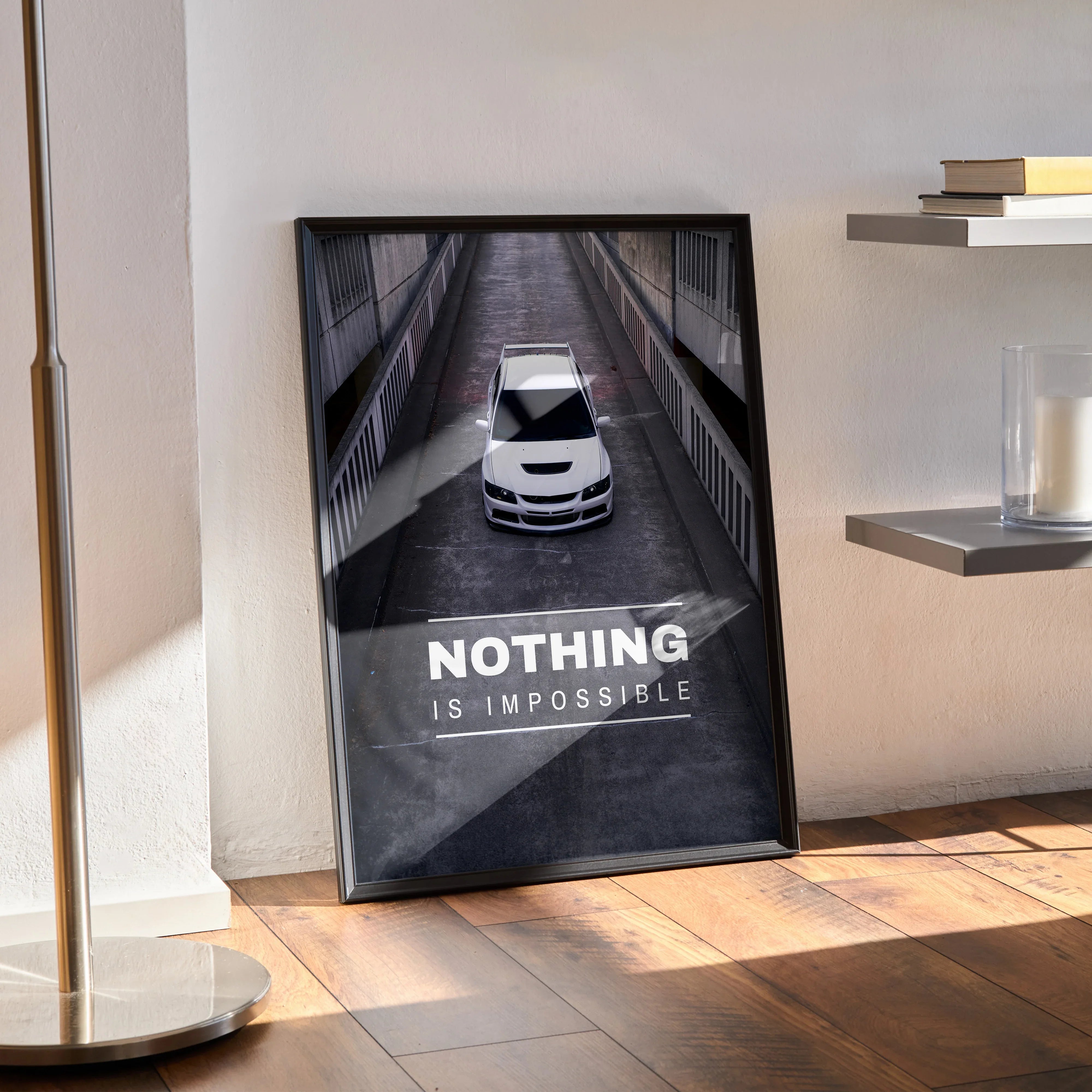 Mitsubishi Evo 8 poster wall art with white car and motivational text "Nothing is impossible" in black frame.