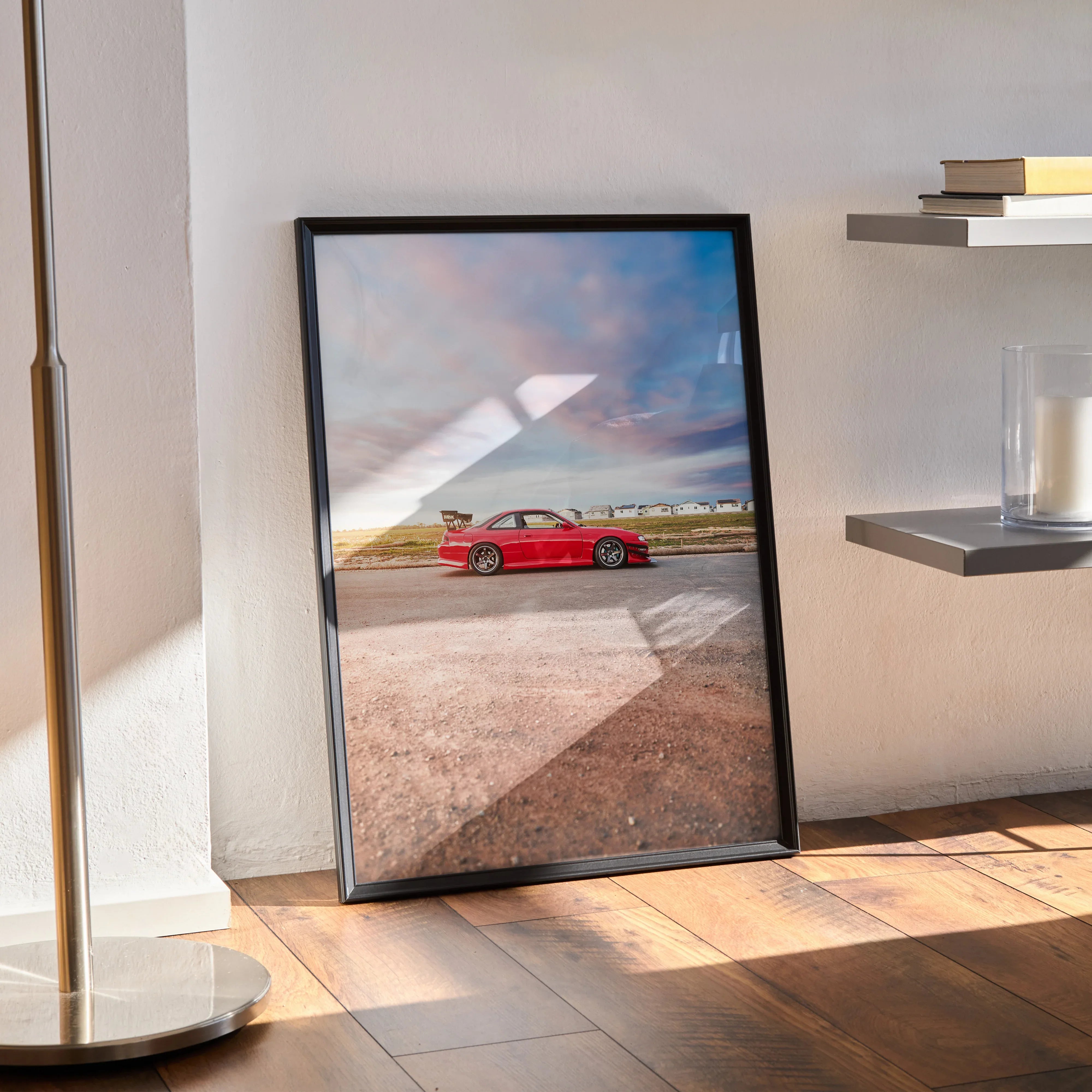 Nissan 240sx S14 Kouki red car wall art poster with scenic sky framed on floor.