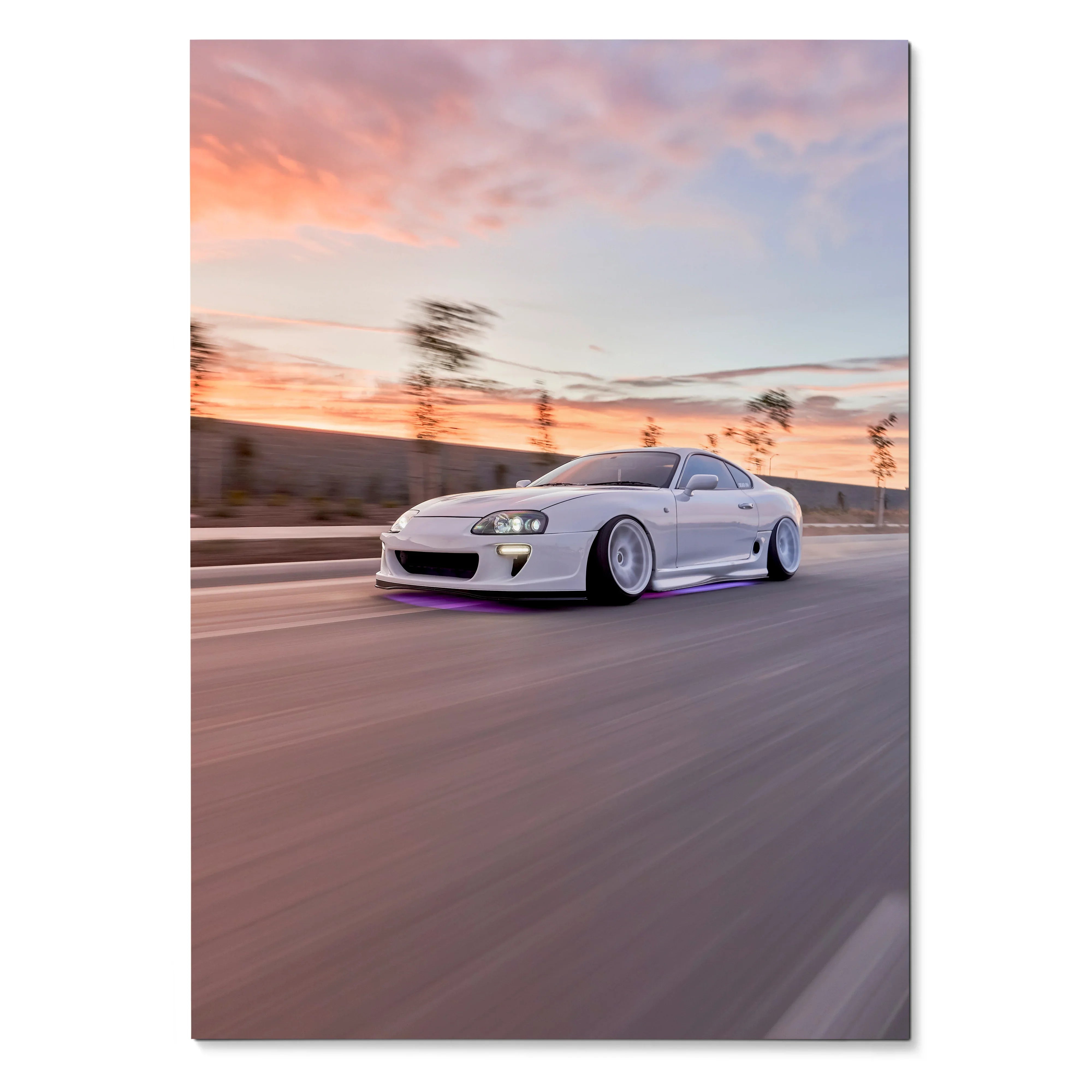 Toyota Supra MK4 white sports car driving at sunset poster wall art with blurred motion background.
