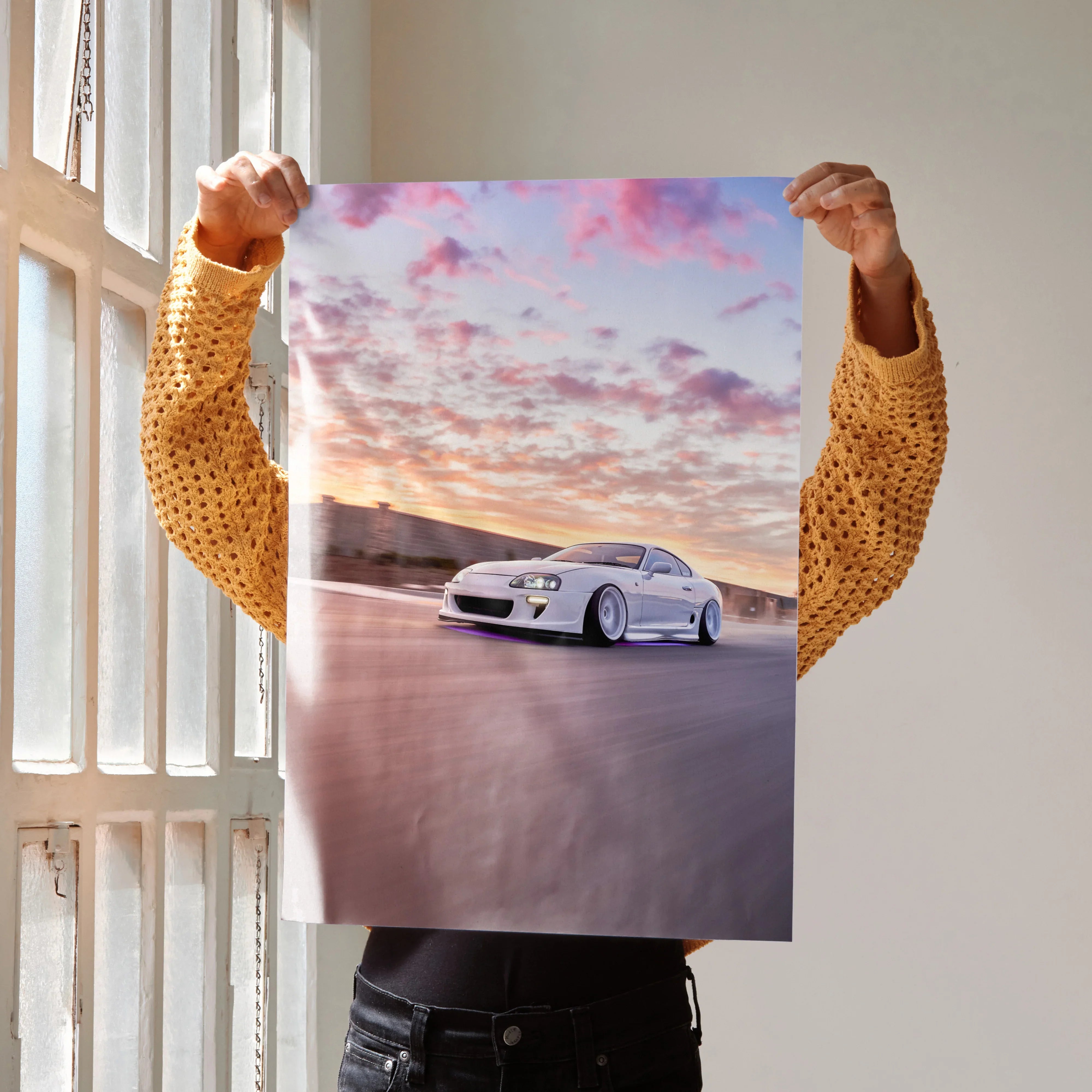 Toyota Supra MK4 poster with white sports car and vibrant sunset sky, automotive wall art.
