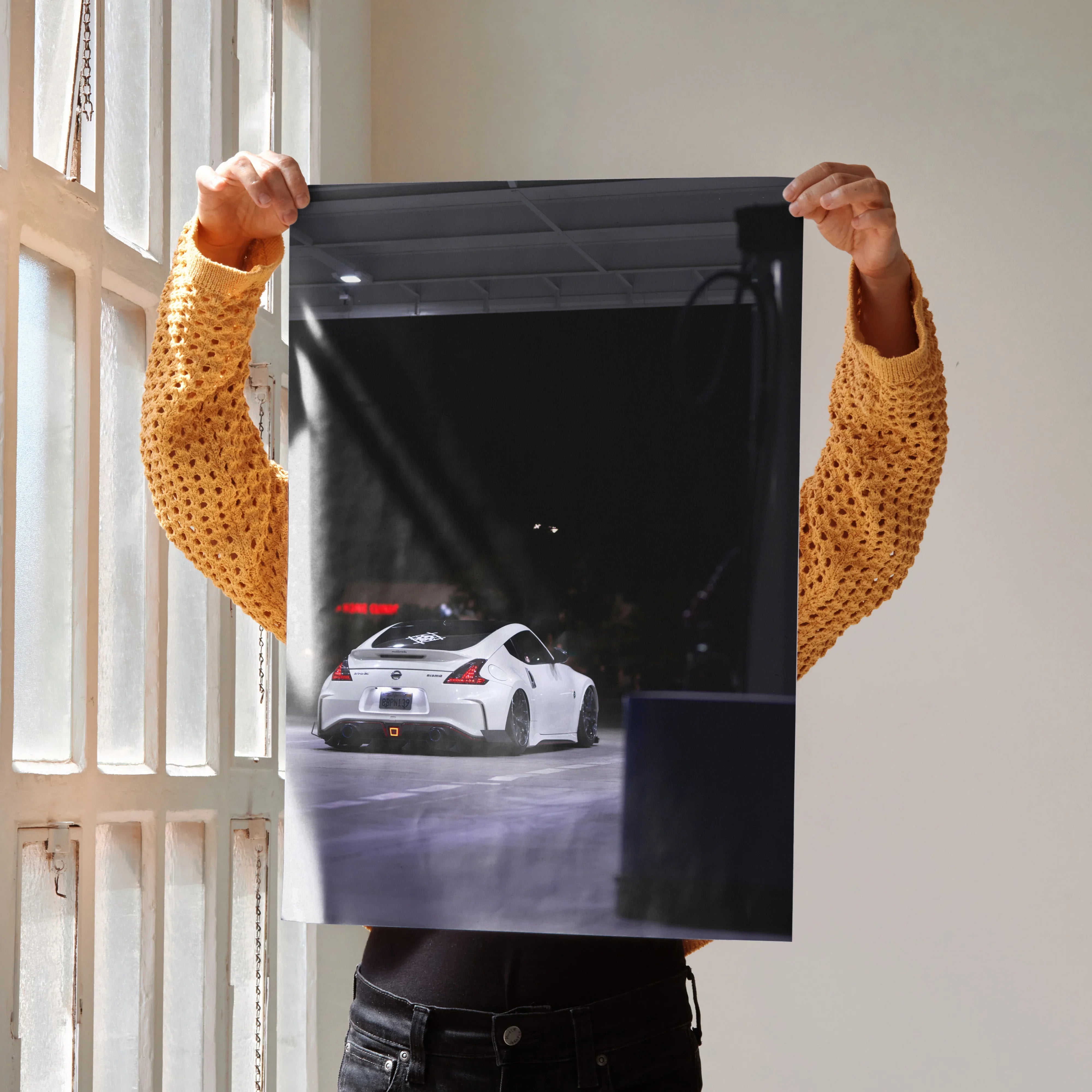 Nissan 370z black and white poster with red accents, automotive wall art in high resolution.