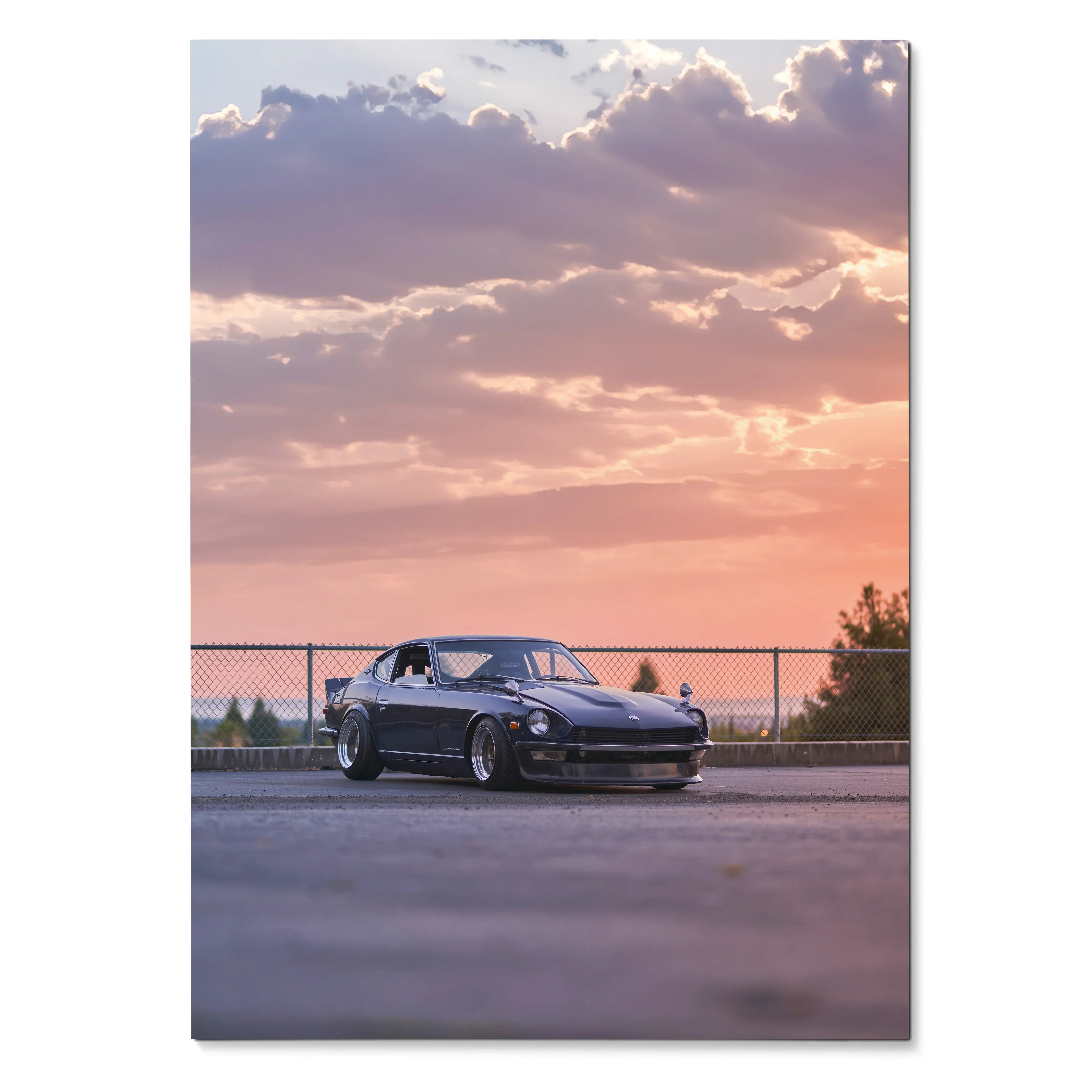 Nissan 240z parked at sunset with vibrant sky in high-resolution poster wall art.