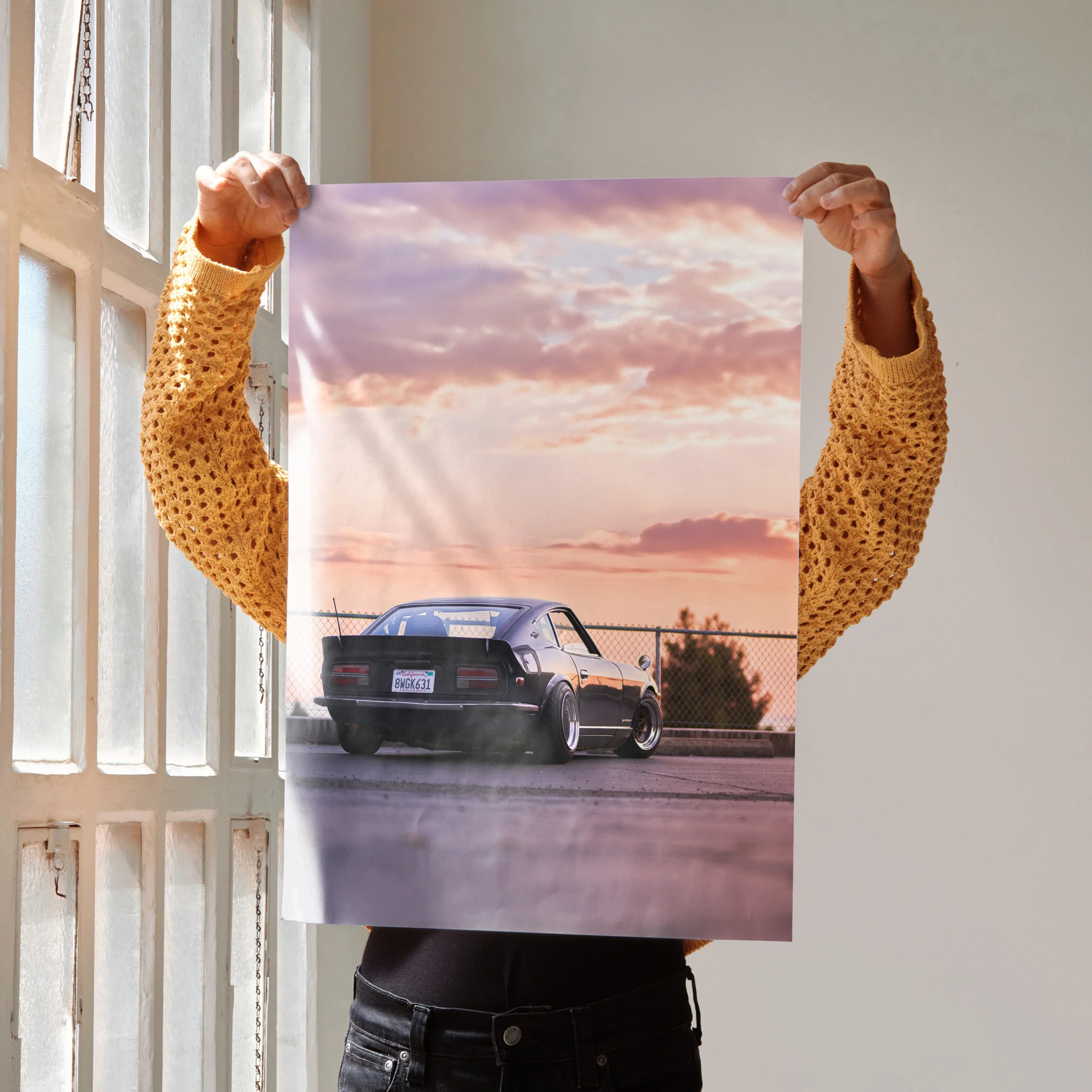 Nissan 240z car poster with sunset sky background, high-resolution wall art in muted tones.