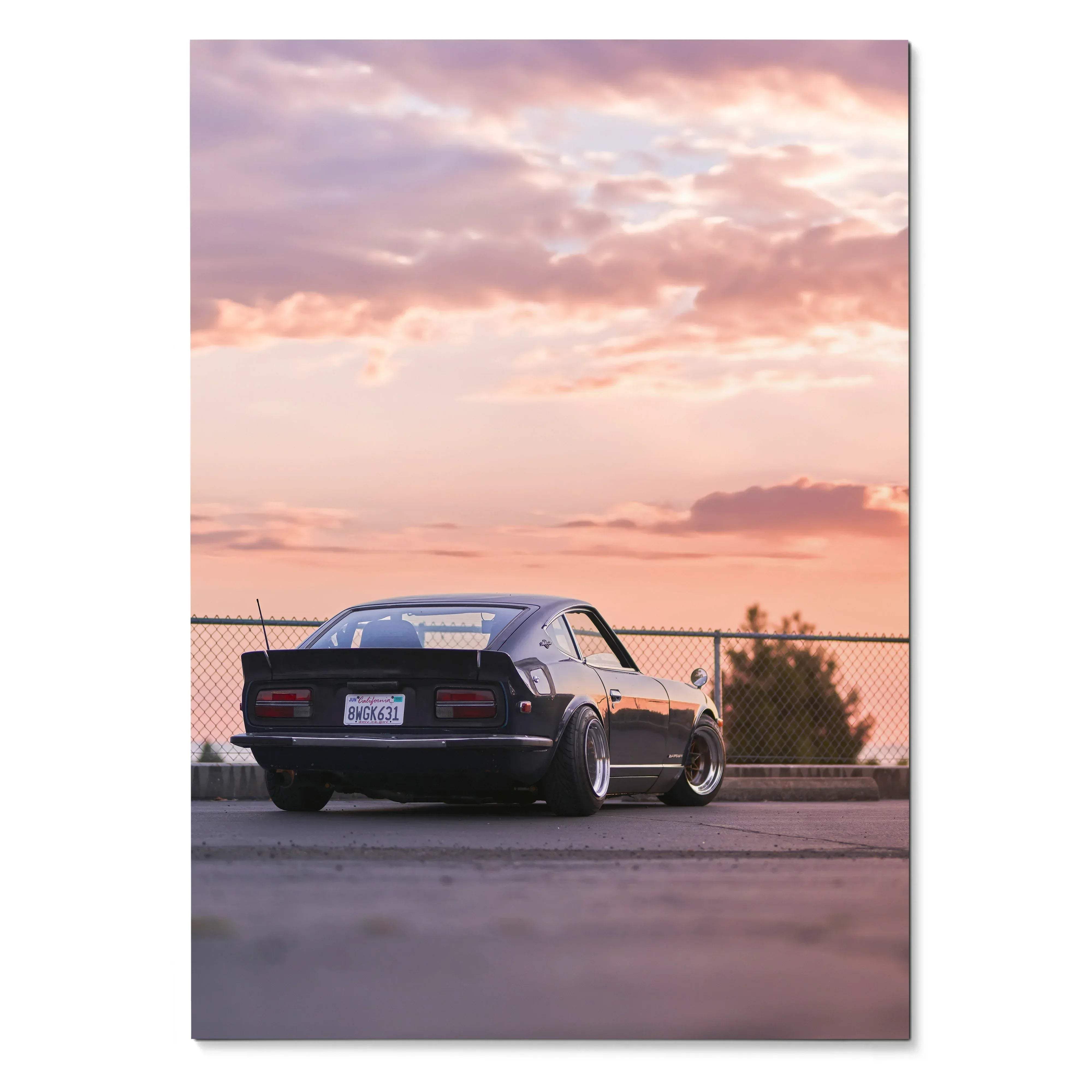 Nissan 240z parked at sunset with pink and orange sky, high resolution poster wall art.