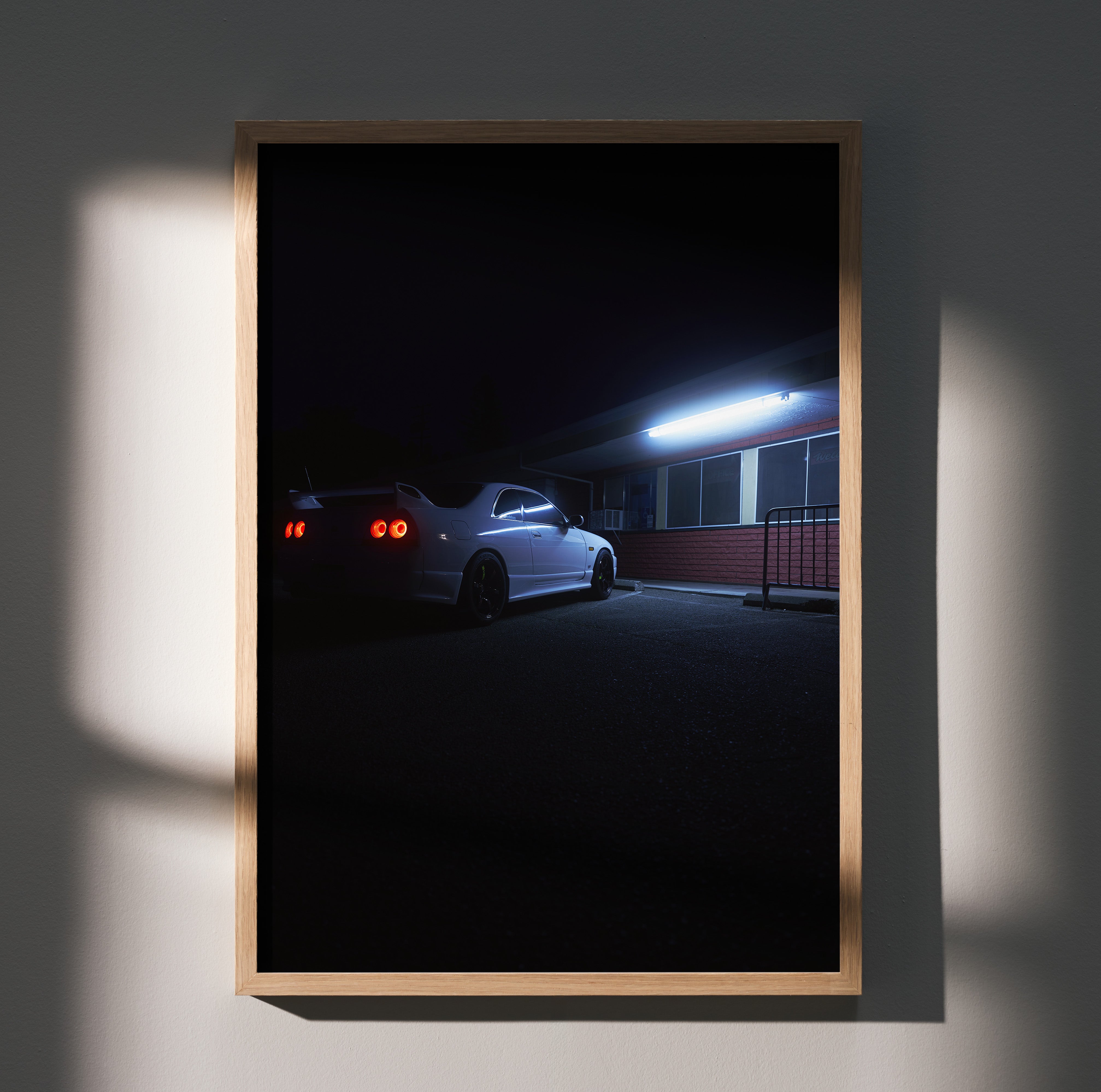 Nissan Skyline R33 GTS-T poster in dark night scene with glowing tail lights, modern wall art print.