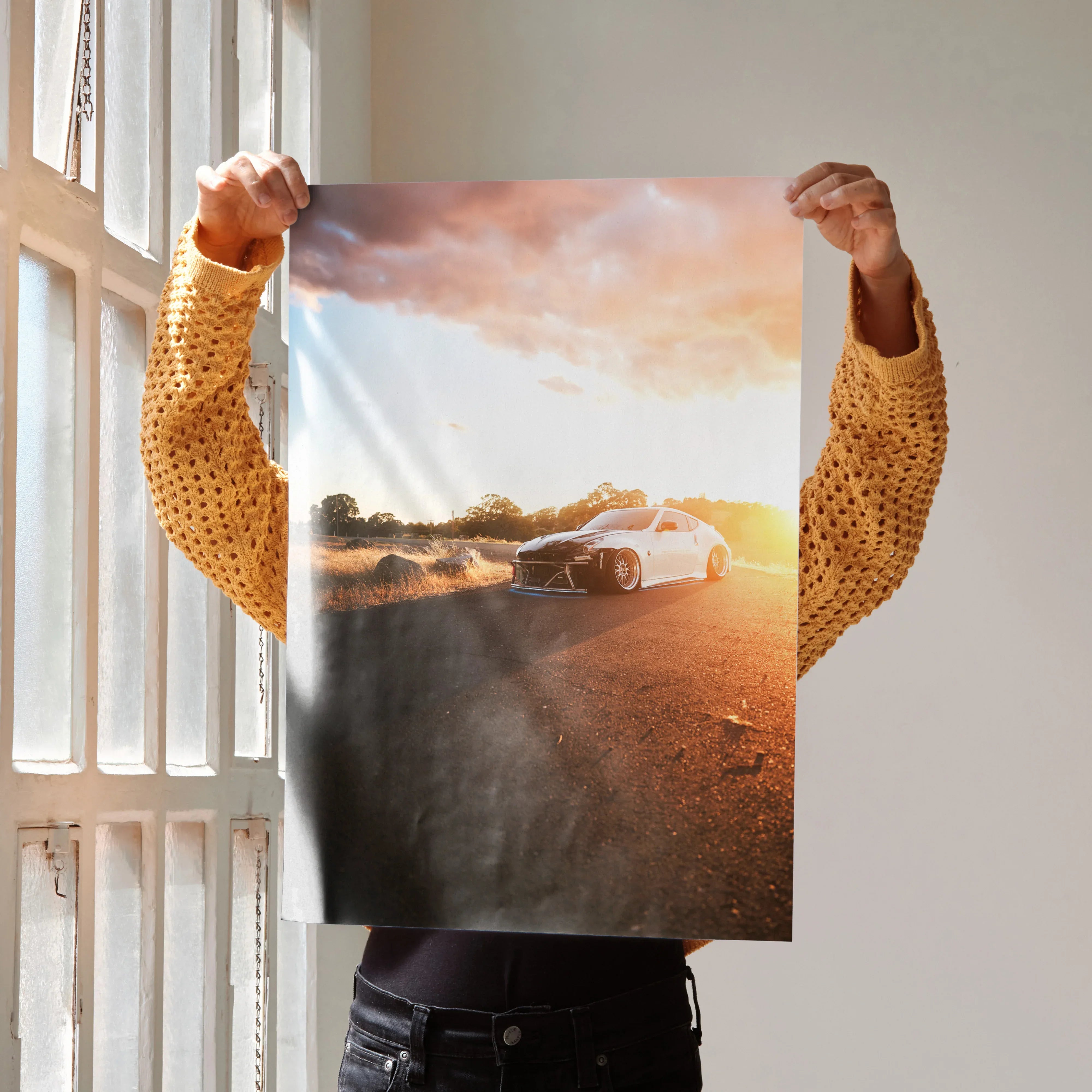Nissan 370z parked on road at sunset with vibrant sky, high resolution poster wall art.
