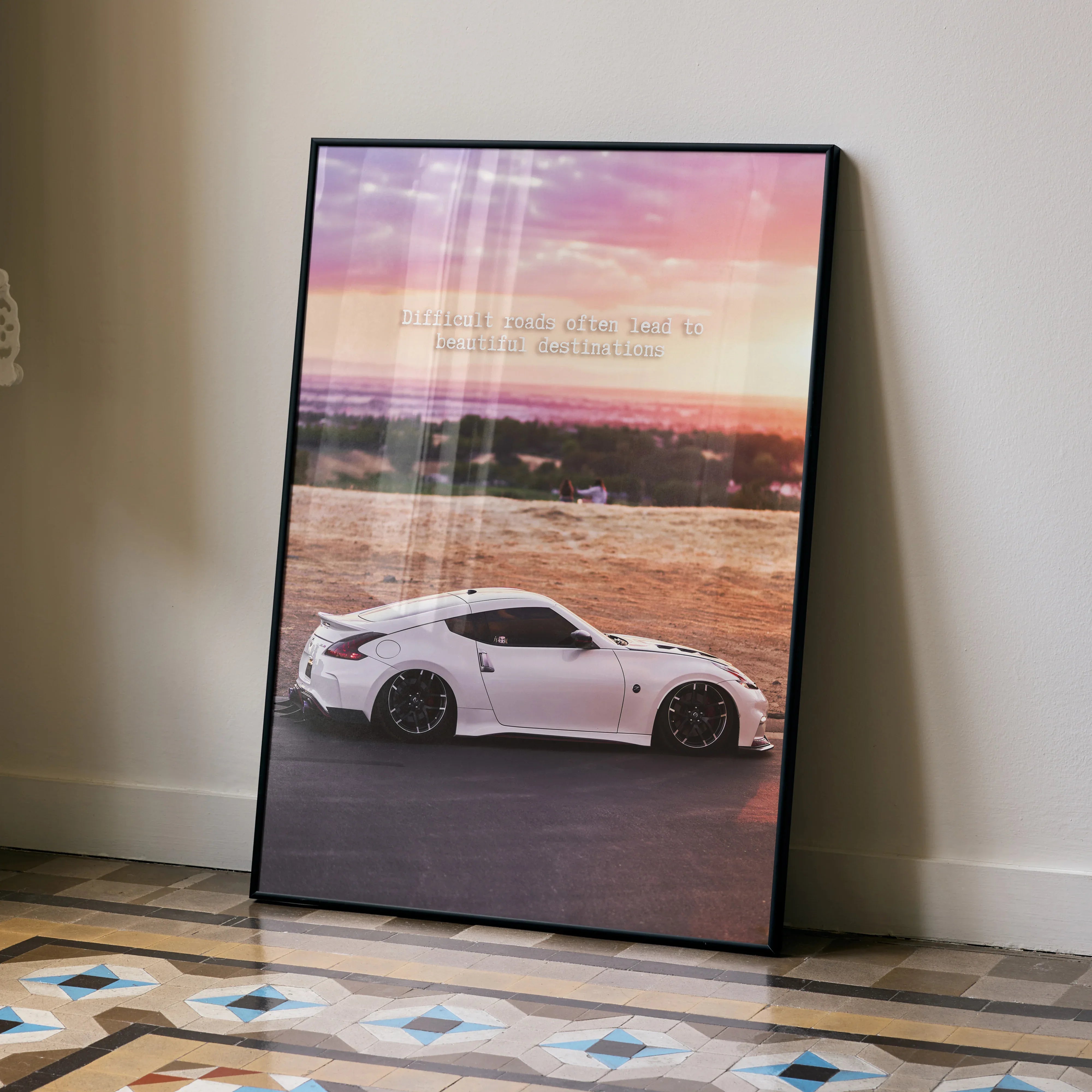 Nissan 370z white car with sunset background motivational quote poster wall art in black frame.