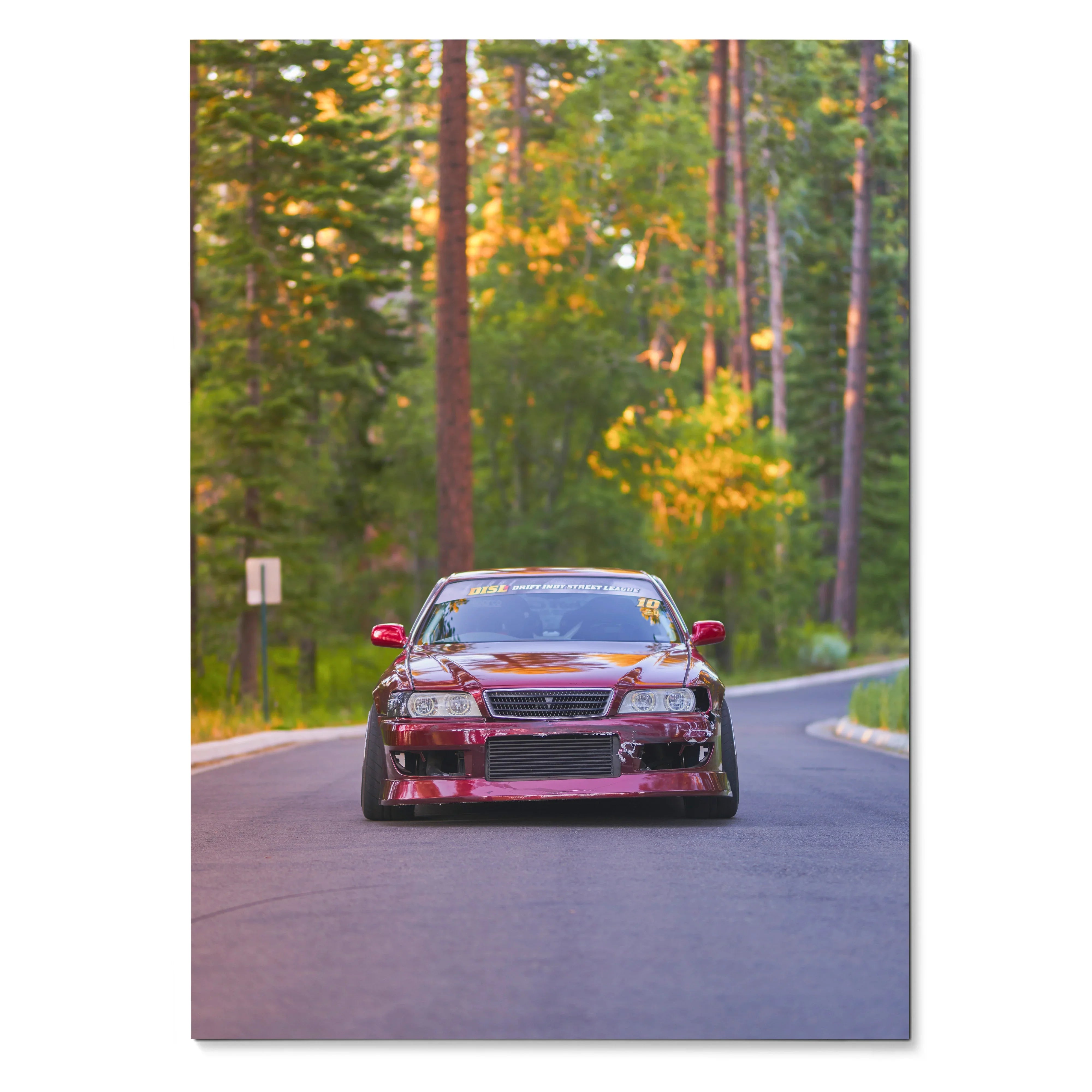 Toyota Chaser JDM drift car poster on winding forest road, vibrant wall art in sunset light.