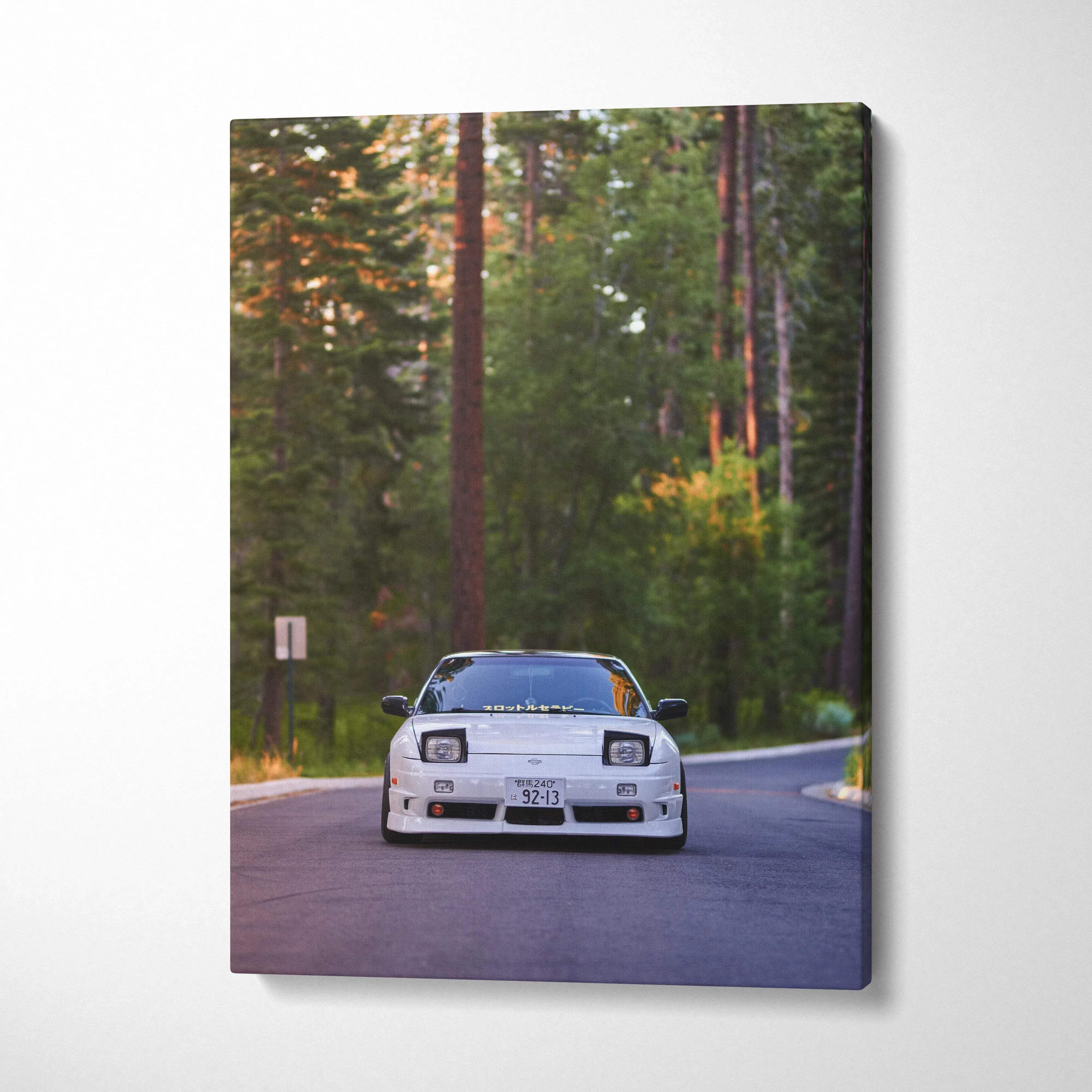 White Nissan 240sx Type X on winding forest road vertical canvas wall art.
