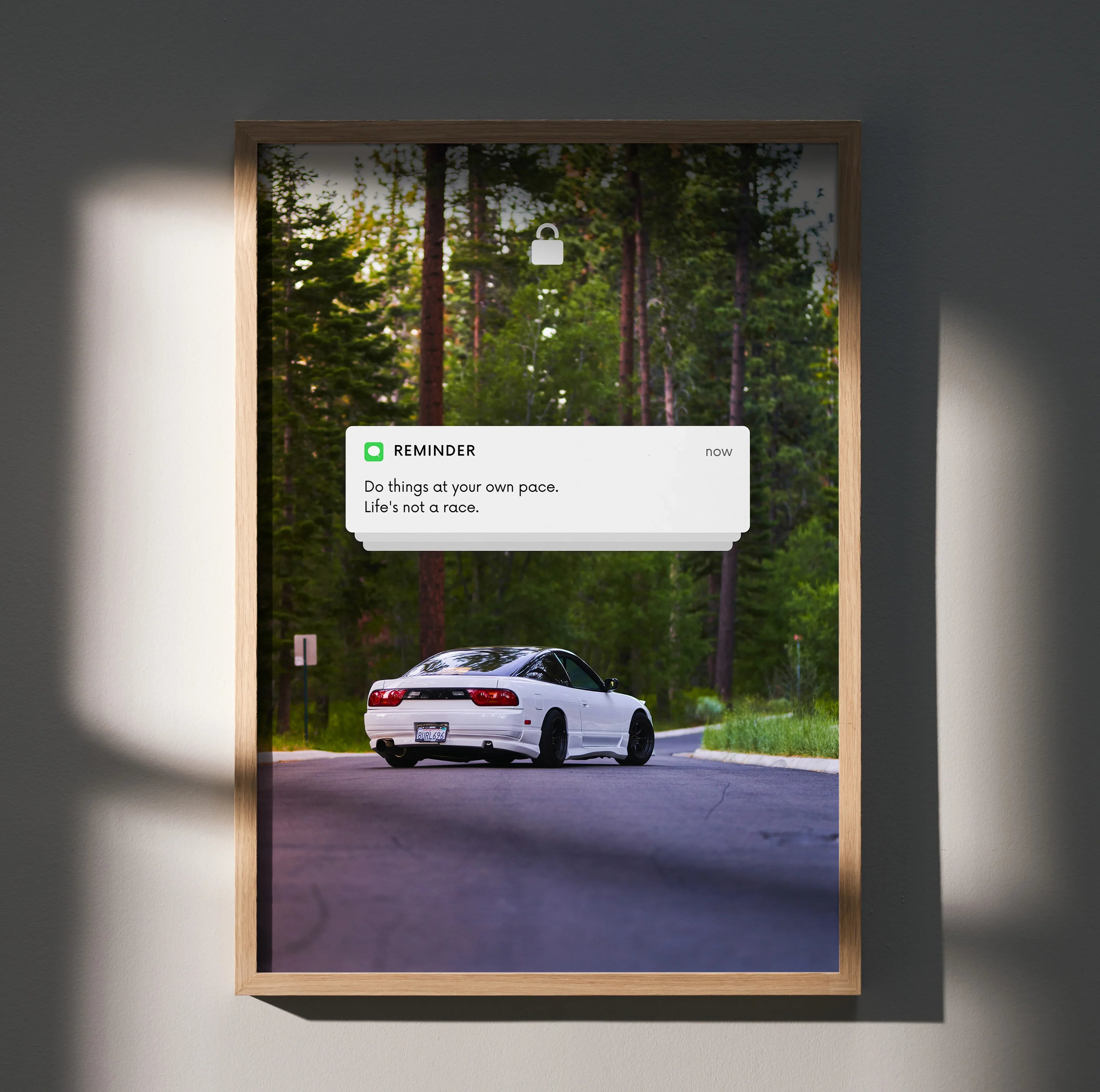 Motivational poster wall art featuring white Nissan 240sx Type-X on forest road with inspiring text reminder.