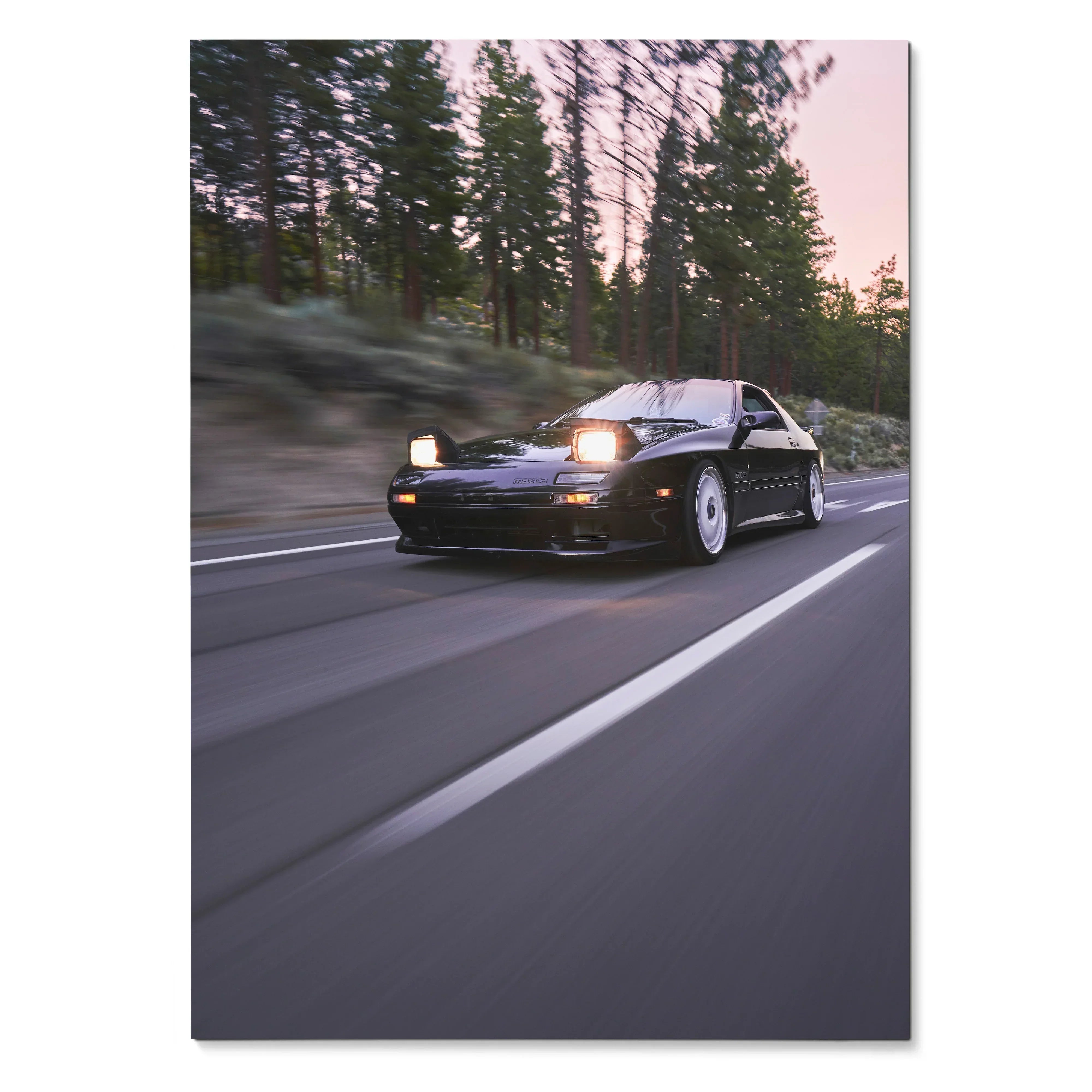 Mazda FC RX7 driving on road at dusk with headlights on poster wall art.
