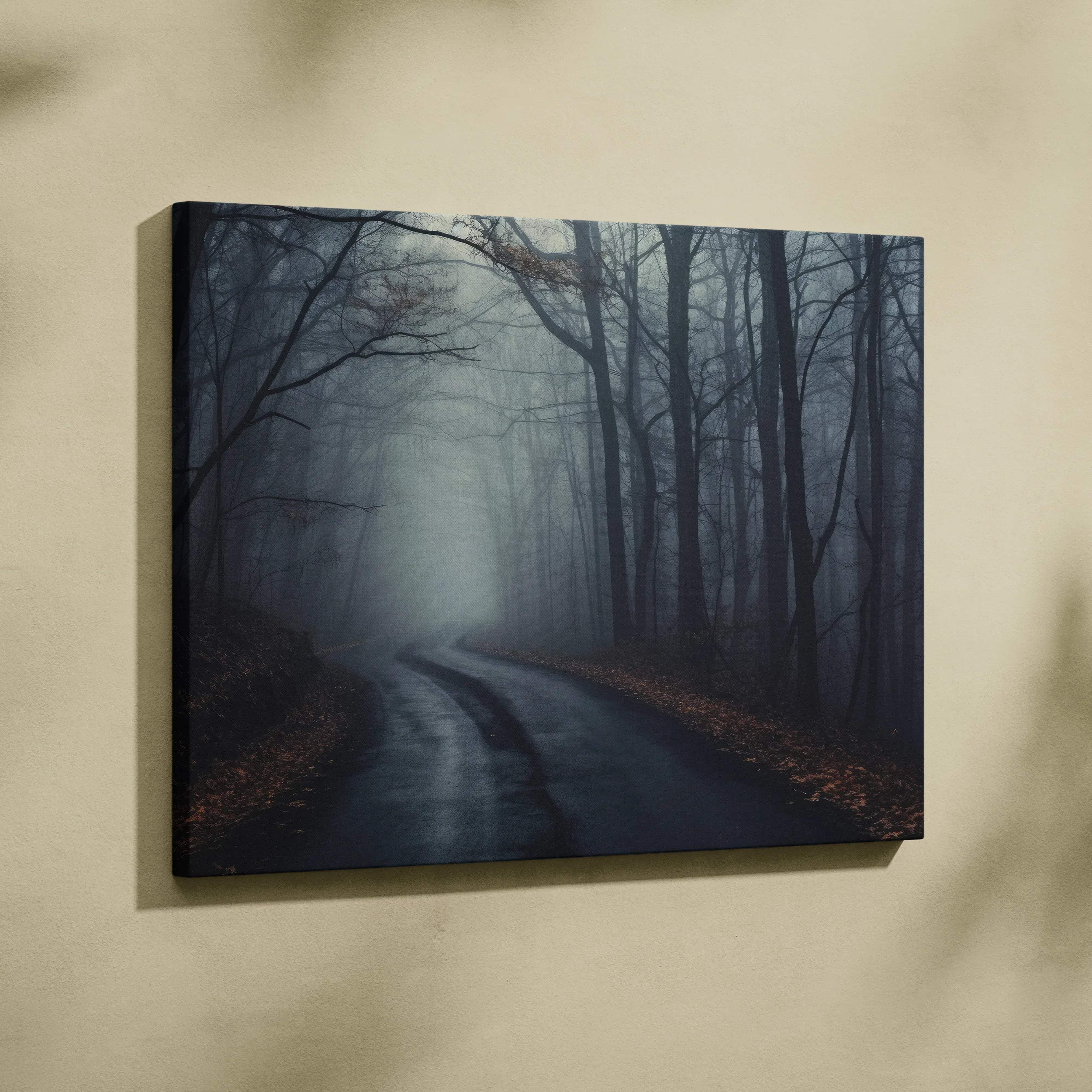 Moody atmospheric forest canvas wall art with dark fog misty blues and layered trees showing a misty forest road with wet pavement framed in black