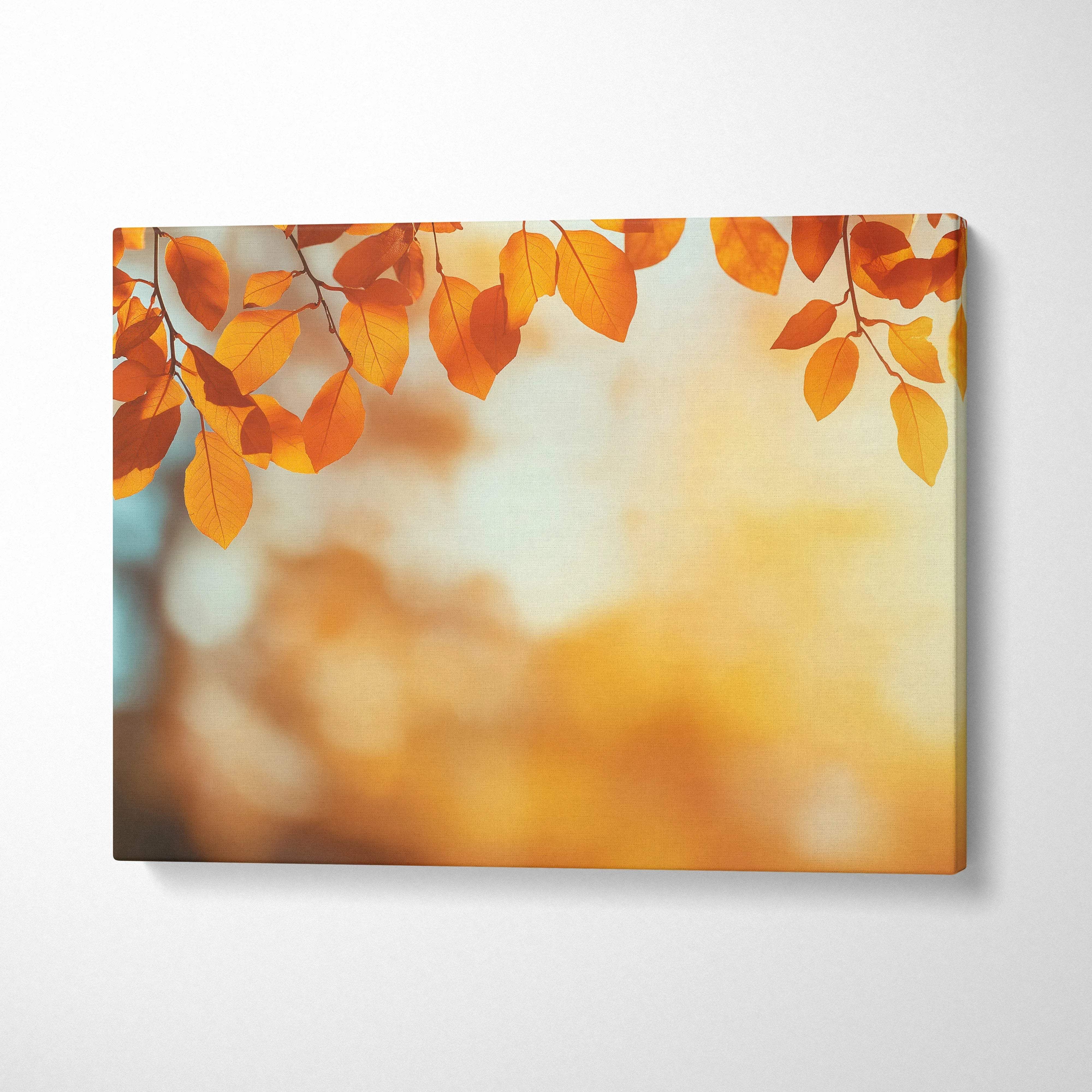 Canvas wall art featuring vibrant golden autumn leaves with a blurred warm digital landscape background.
