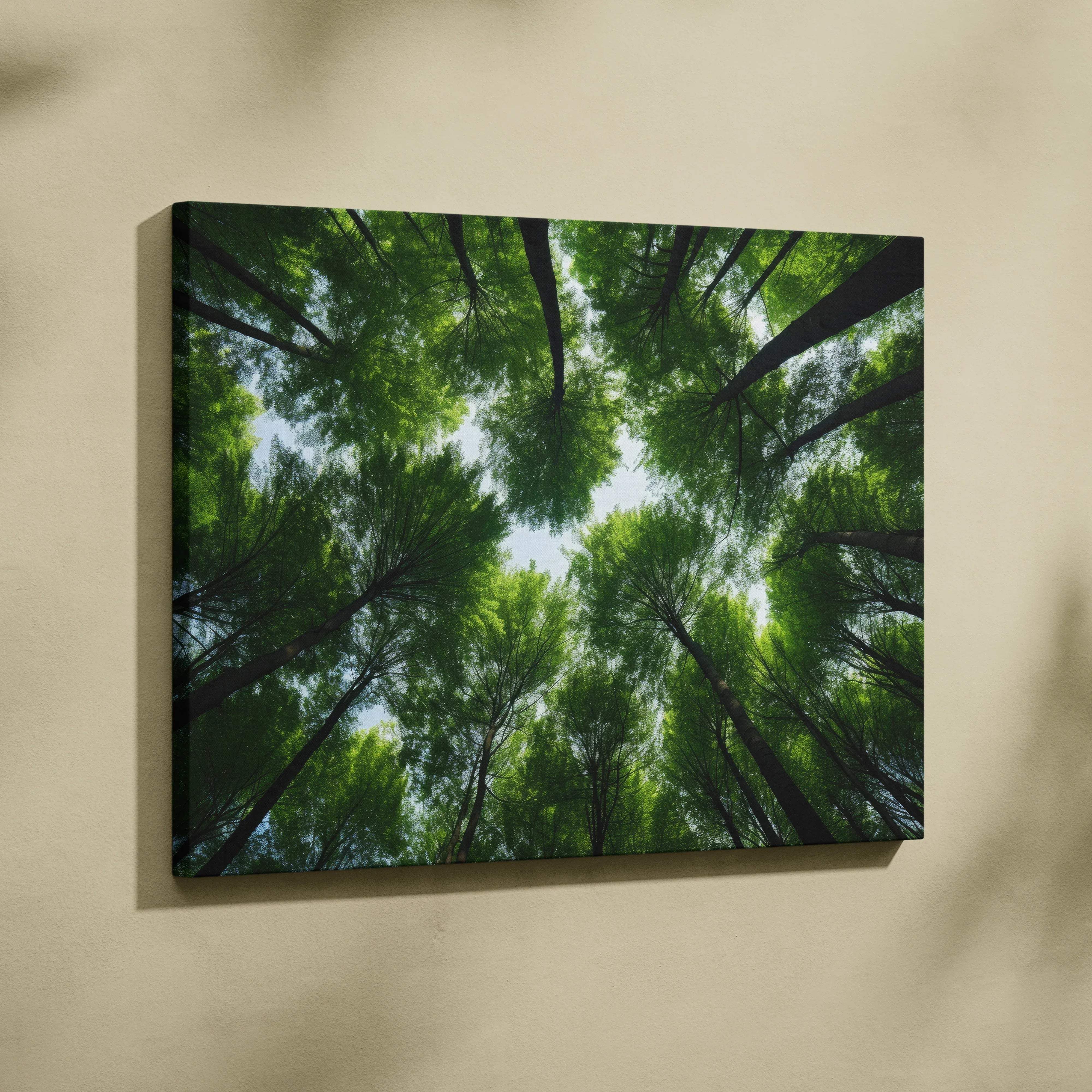Rectangular canvas wall art featuring a vibrant green forest canopy with tall tree trunks framed by black edges