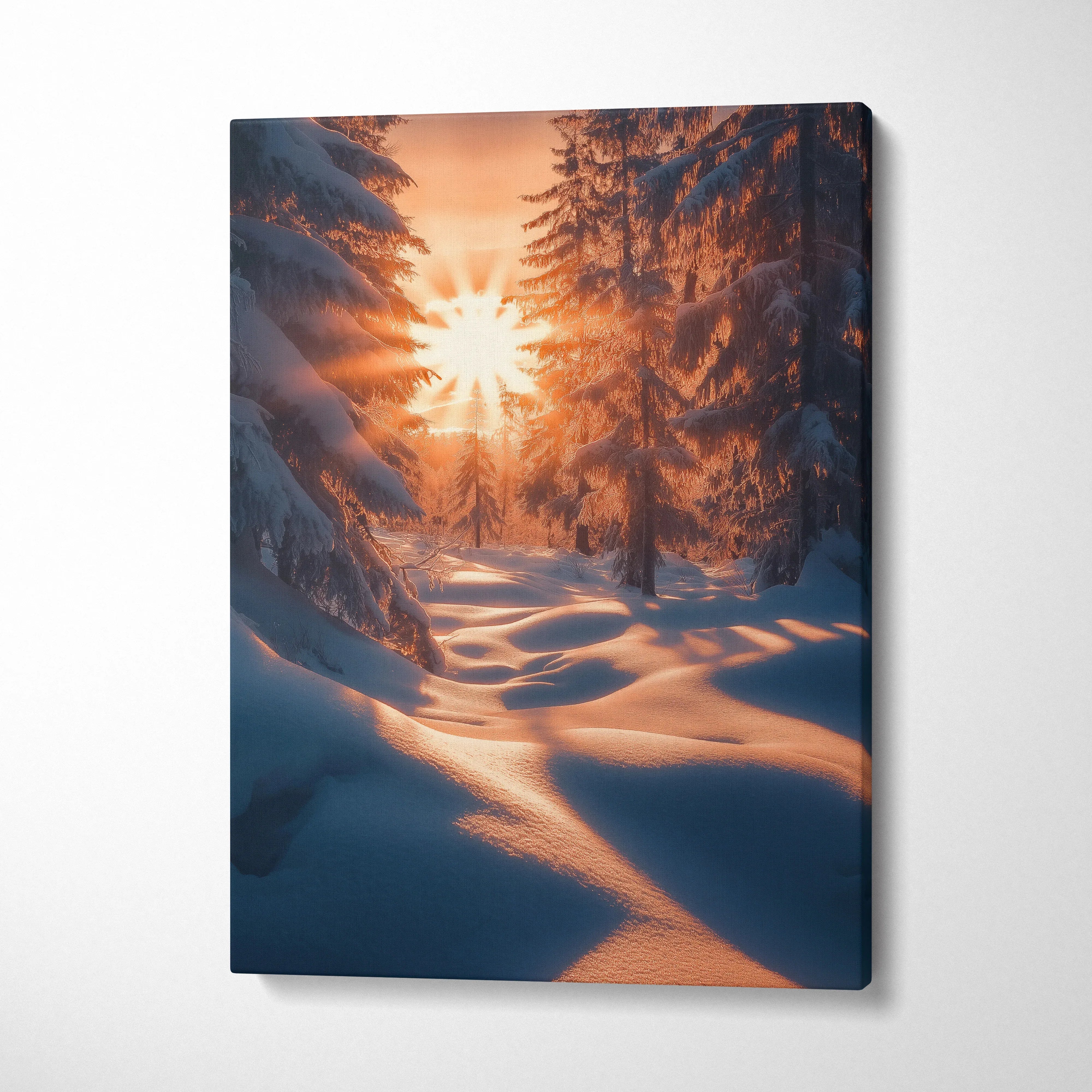 Canvas wall art depicting a snowy forest path at sunset with sun rays filtering through trees.