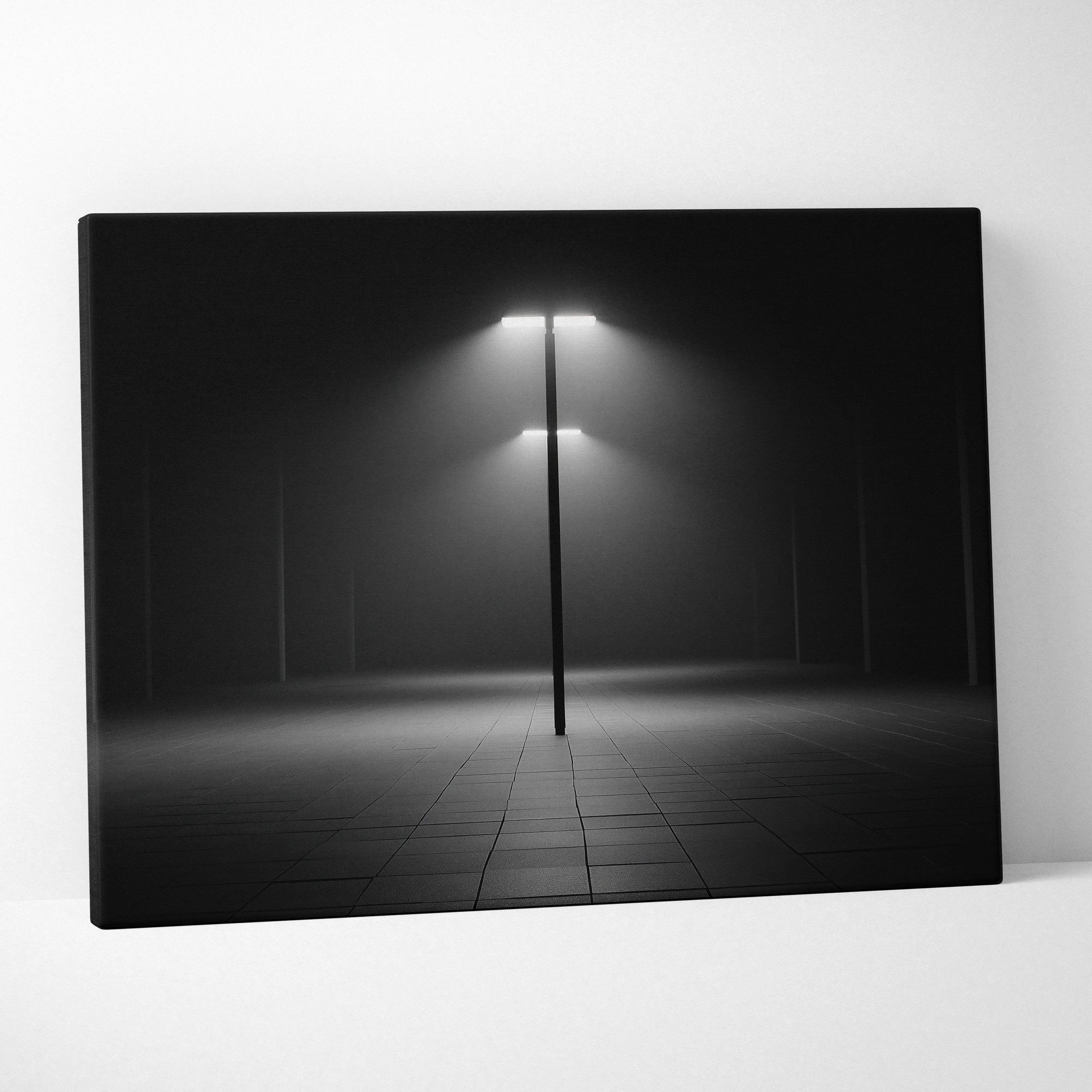 Black and white canvas wall art featuring a solitary streetlamp casting light through foggy wilderness