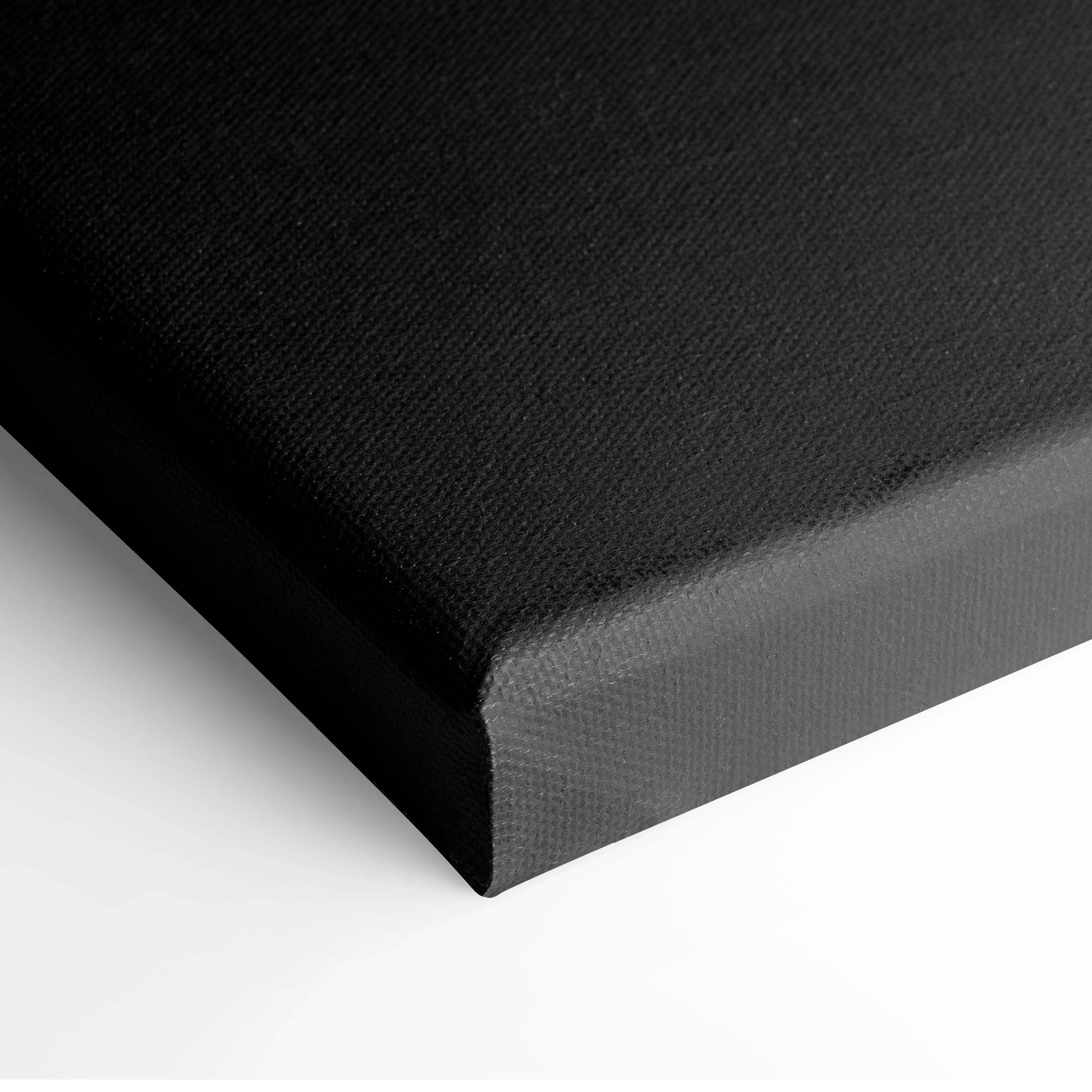 Black canvas print with textured woven surface and raised edges minimalist mountain landscape in misty gray tones