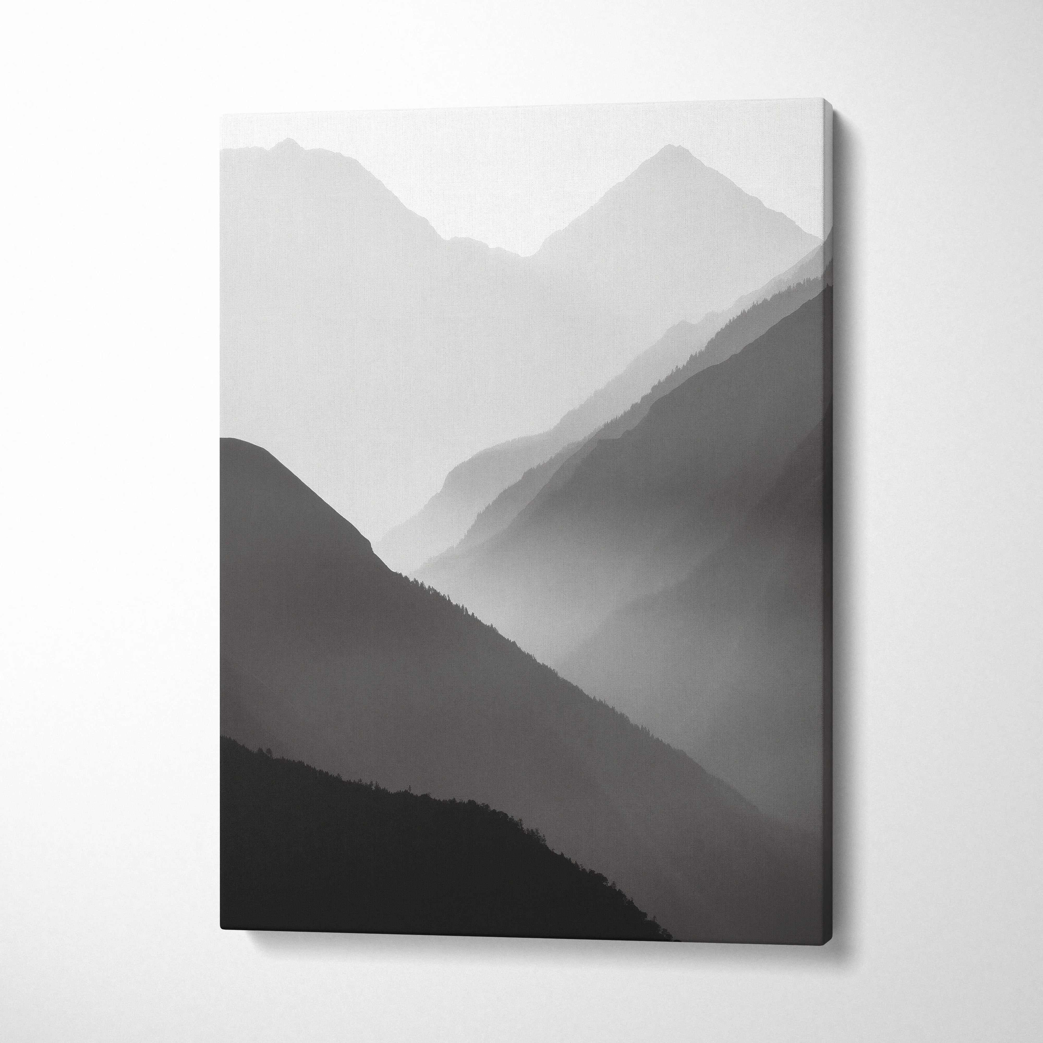 Minimalist black and gray mountain landscape canvas wall art with misty layers for modern decor.