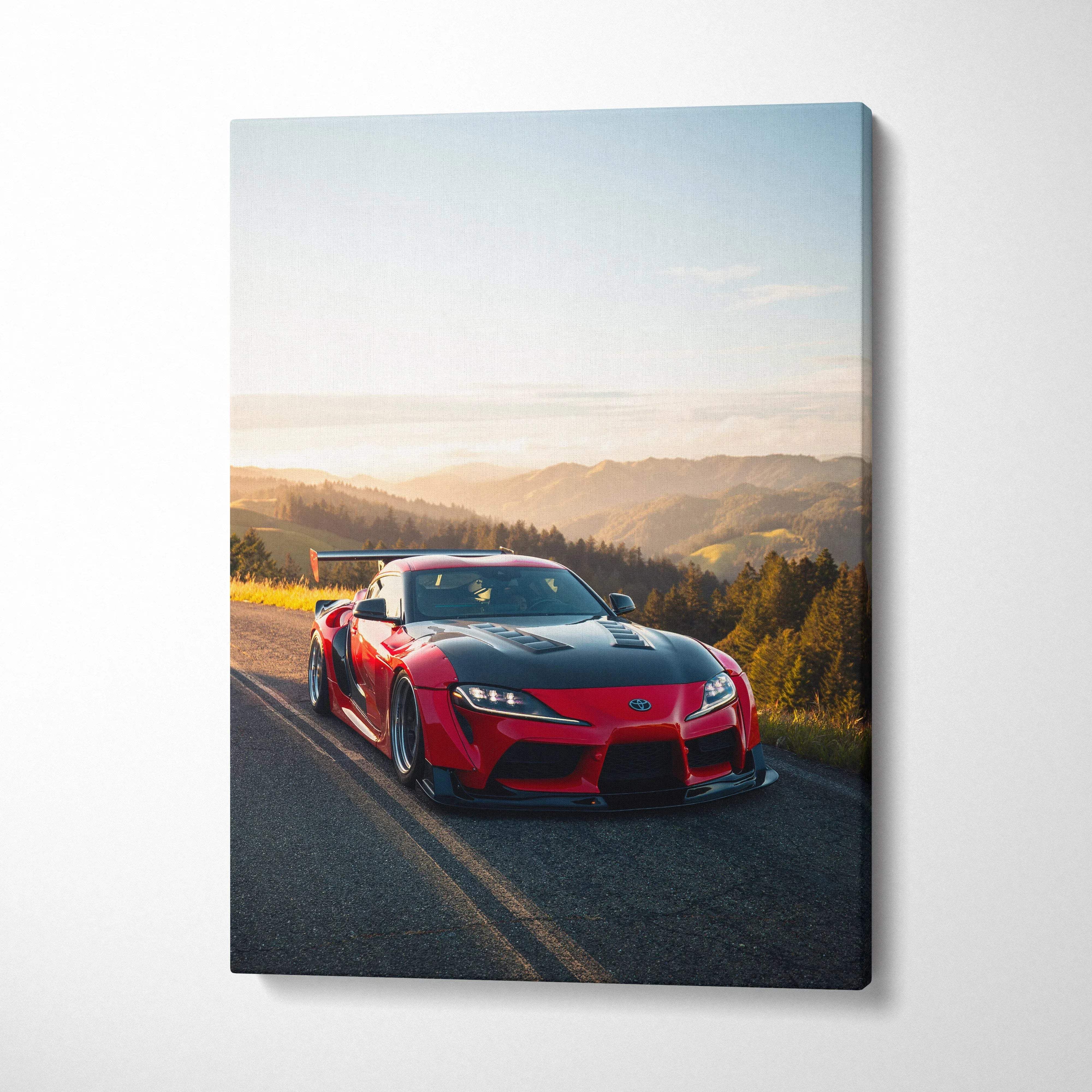 Red Toyota Supra MK5 on scenic road at sunset canvas wall art print.