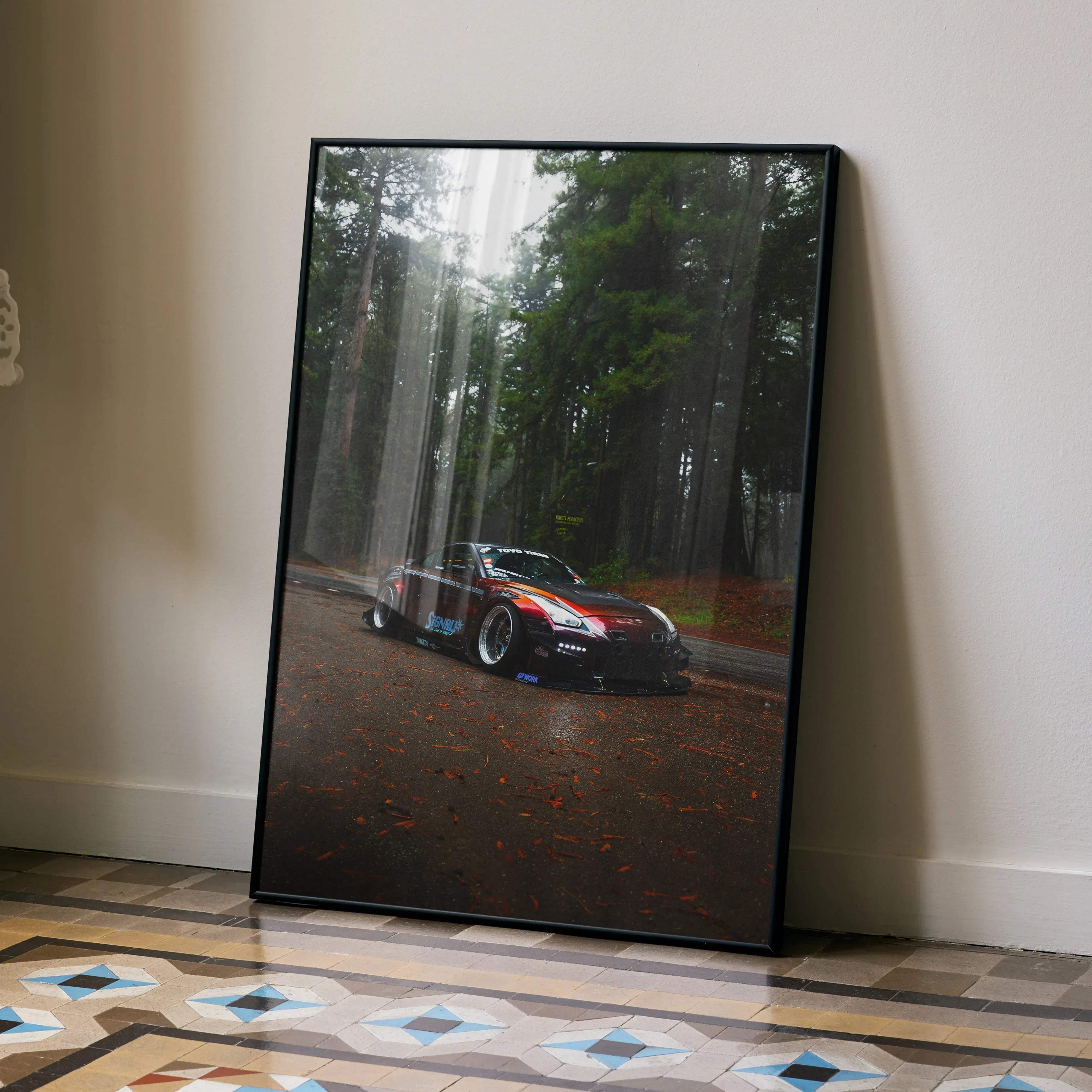 Black-framed art print poster of a red and black nissan gt-r r35 drifting through a misty forest premium wall decor