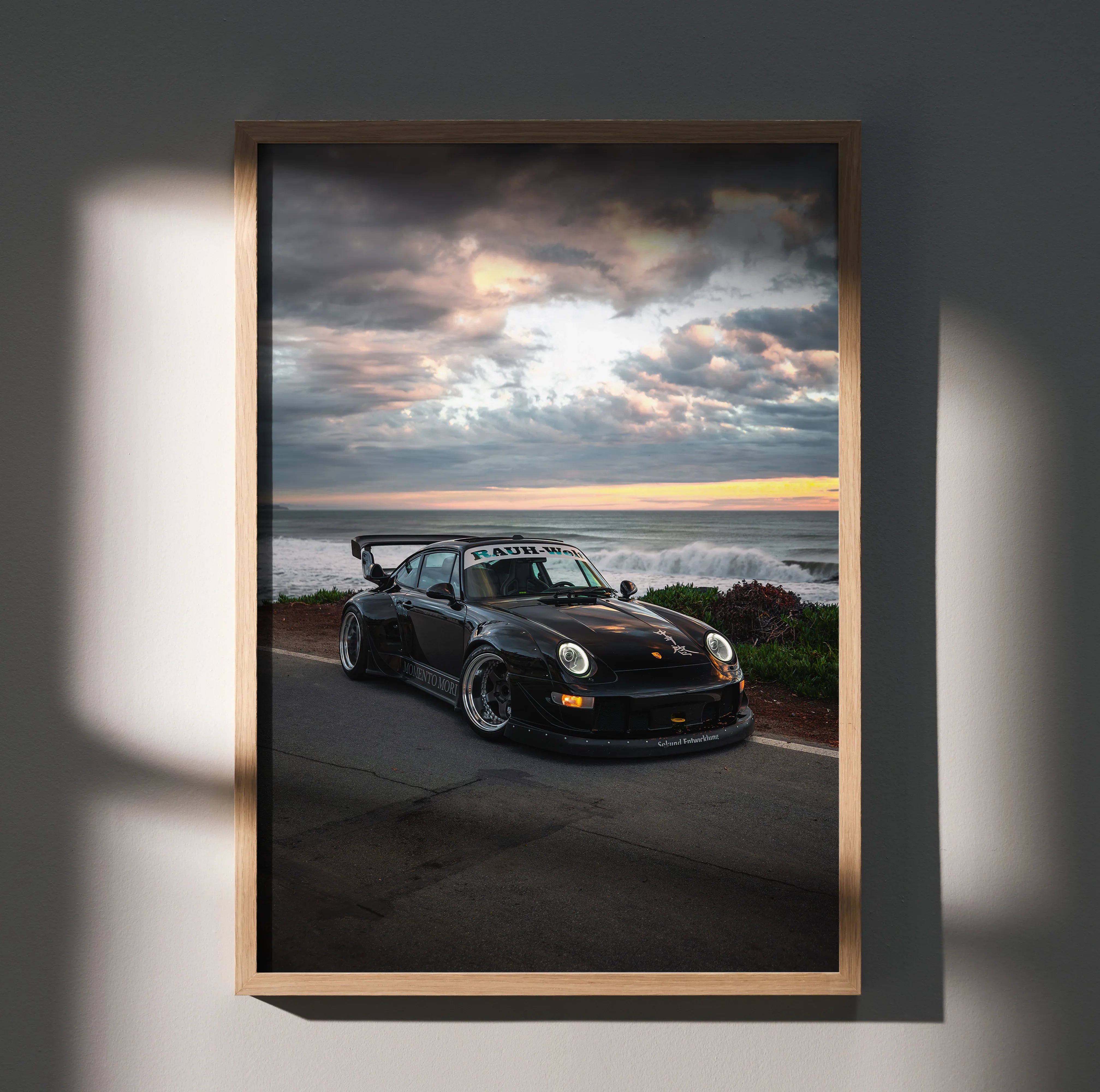 RWB Porsche 911 poster wall art with black wide-body car at sunset by the sea.