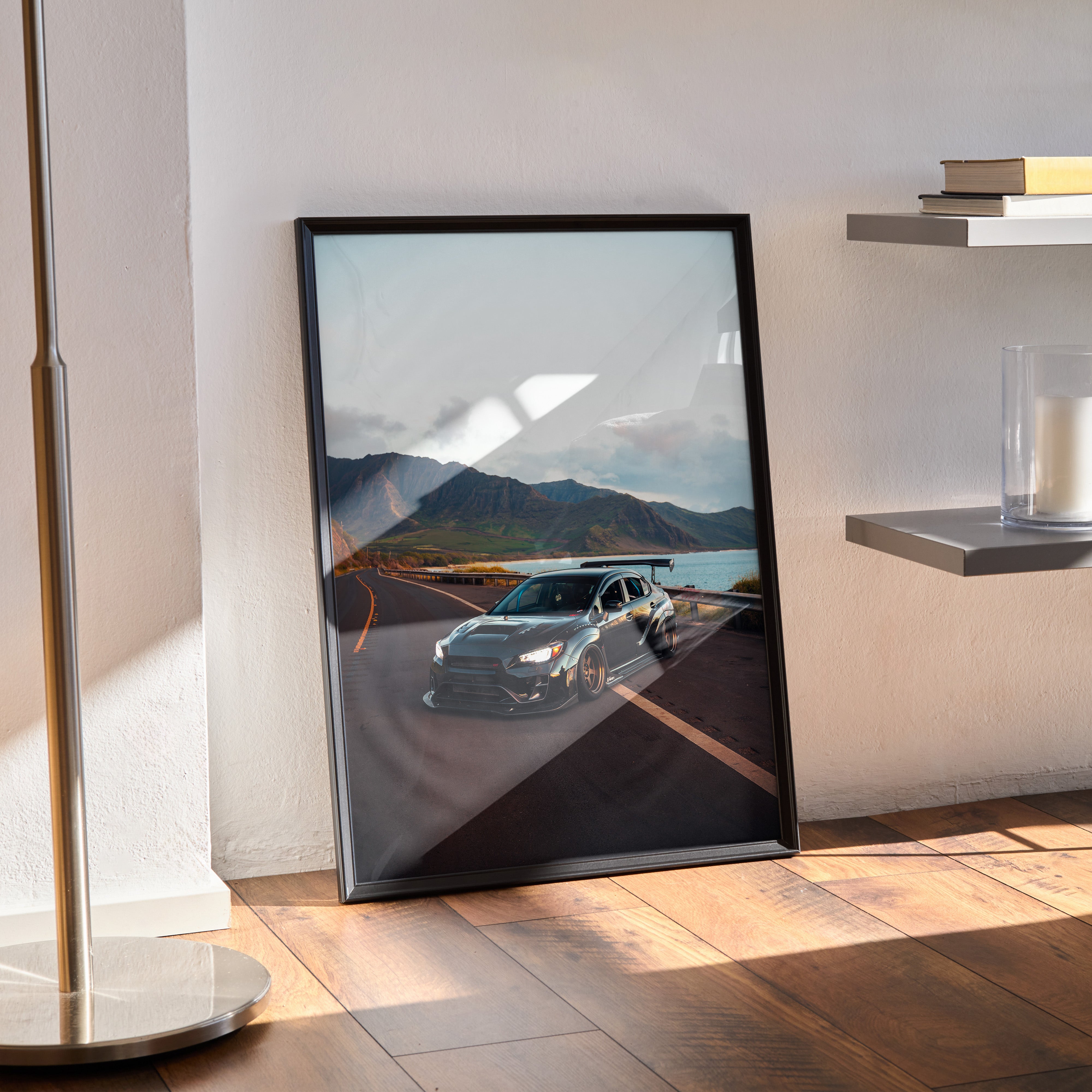 Subaru WRX STI on mountain road poster with black frame, modern wall art decor.