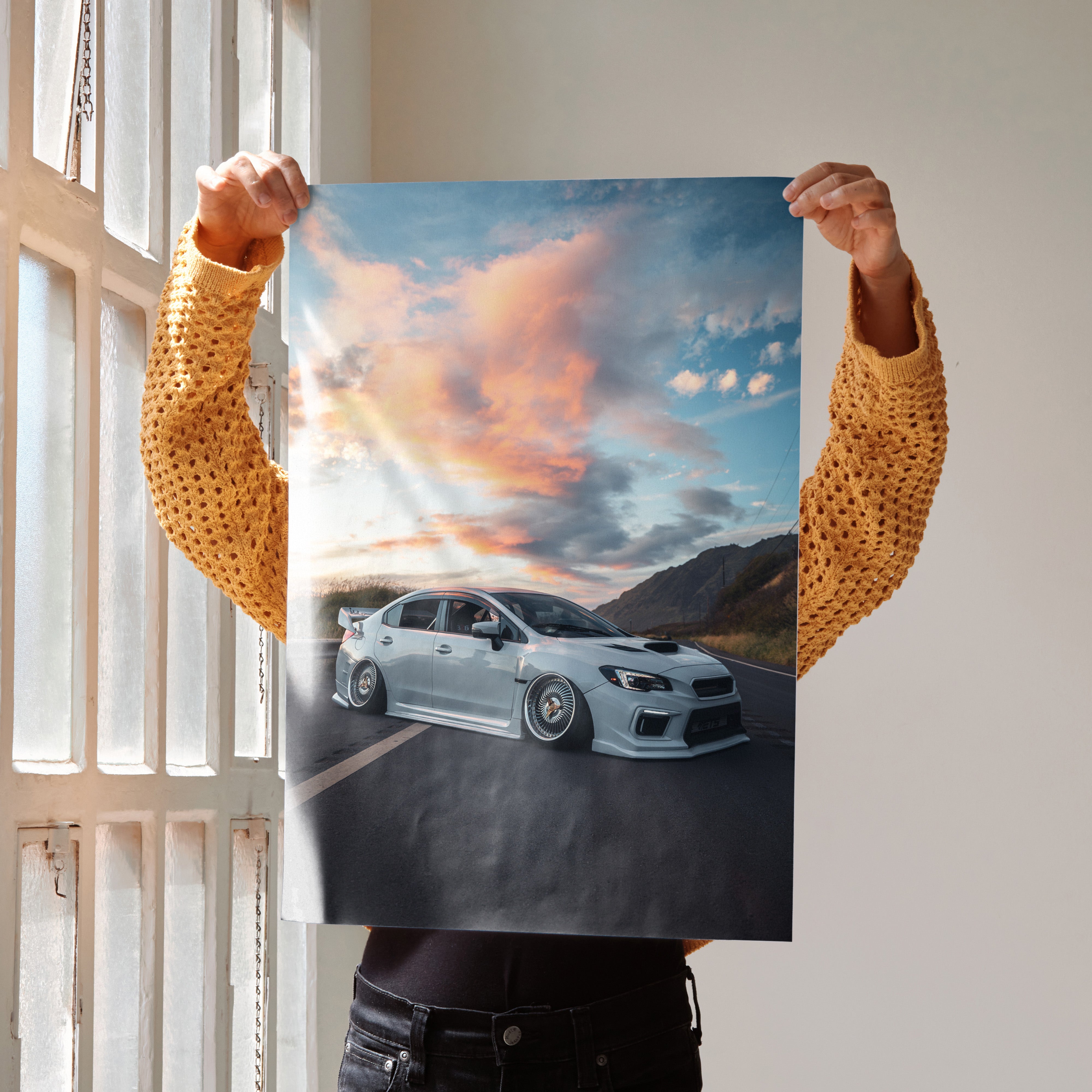 Subaru WRX racing car on road during sunset poster wall art with vibrant sky colors.