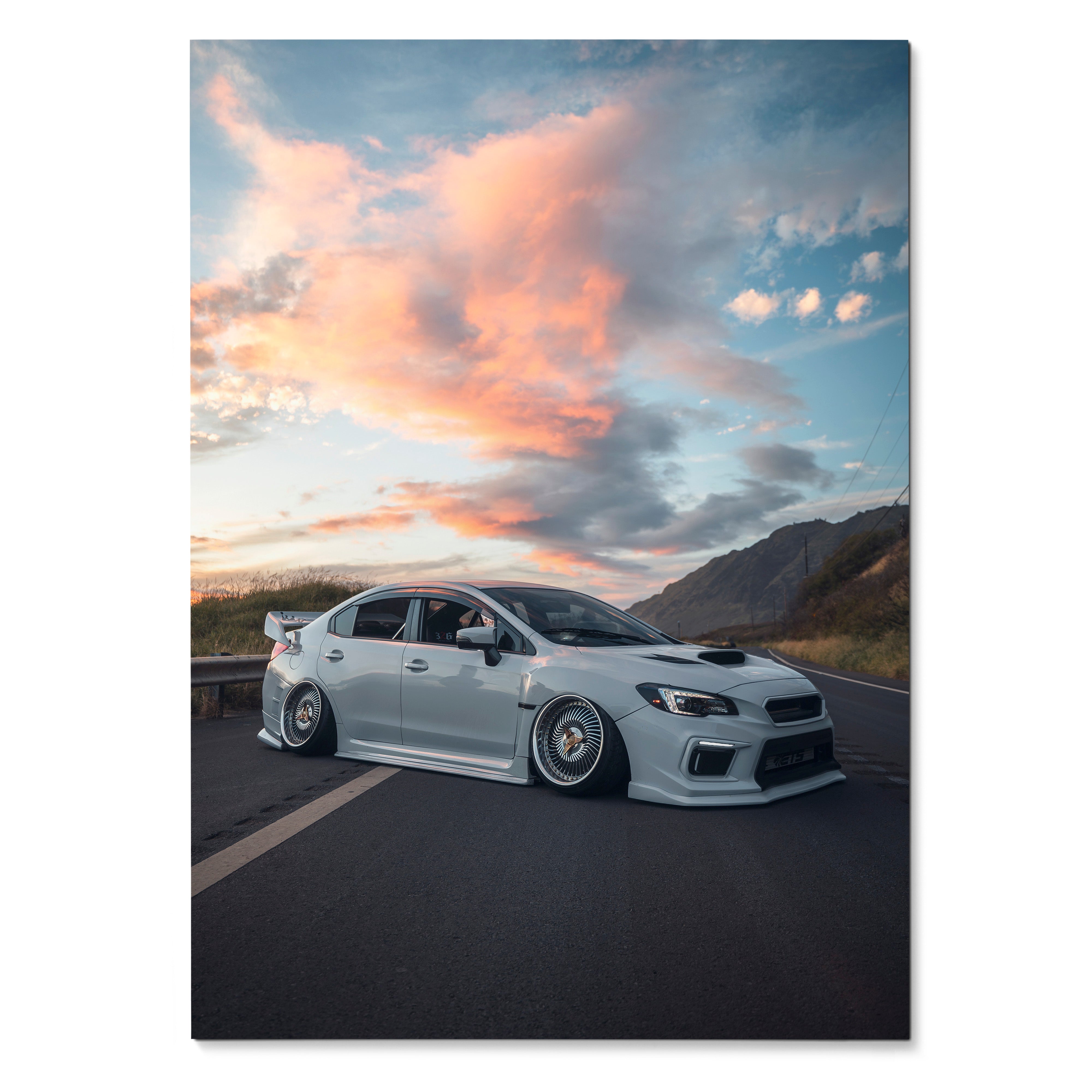 Subaru WRX parked on road at sunset with colorful clouds poster wall art.