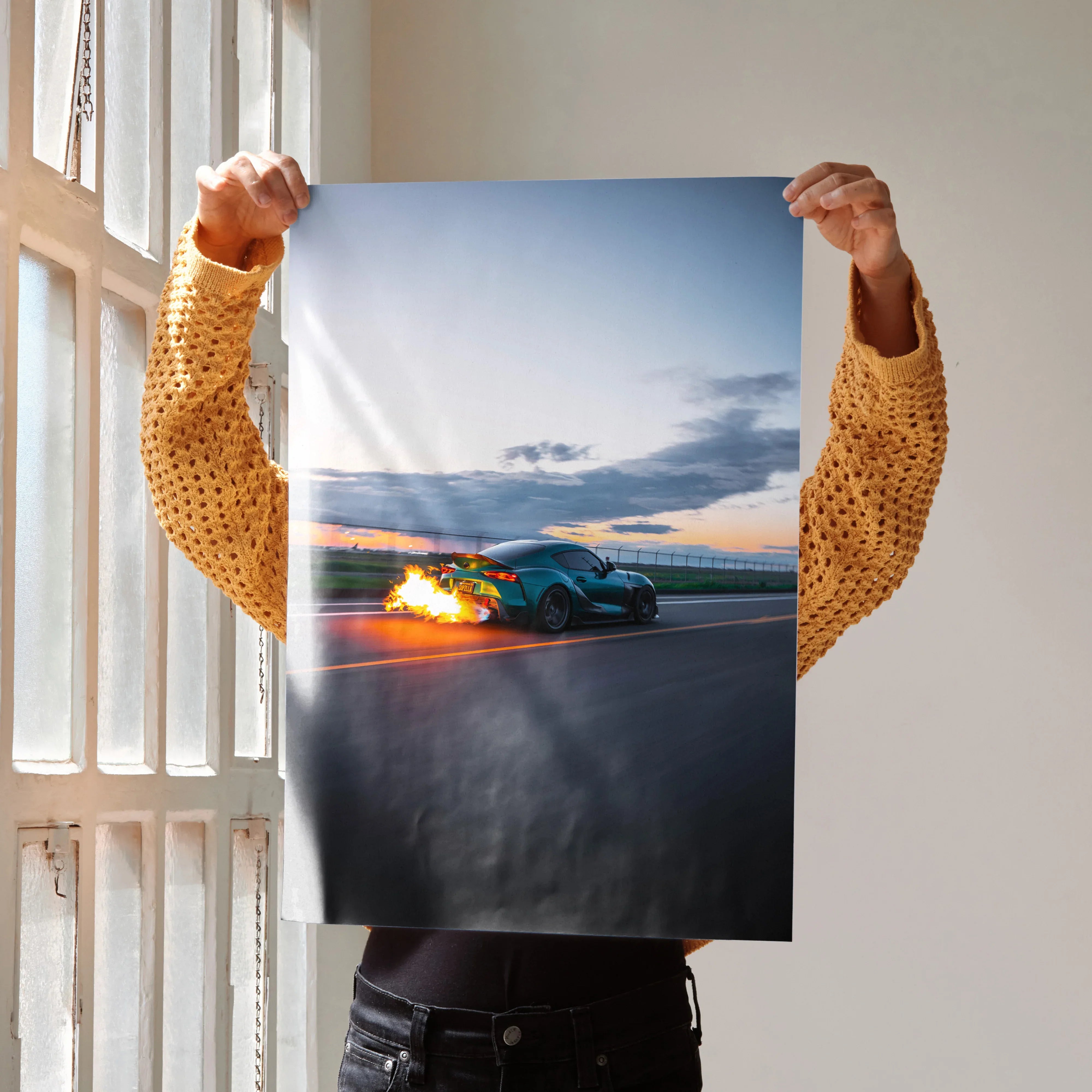 Toyota Supra Mk5 poster with fiery burnout on racetrack, high-resolution wall art for car lovers.