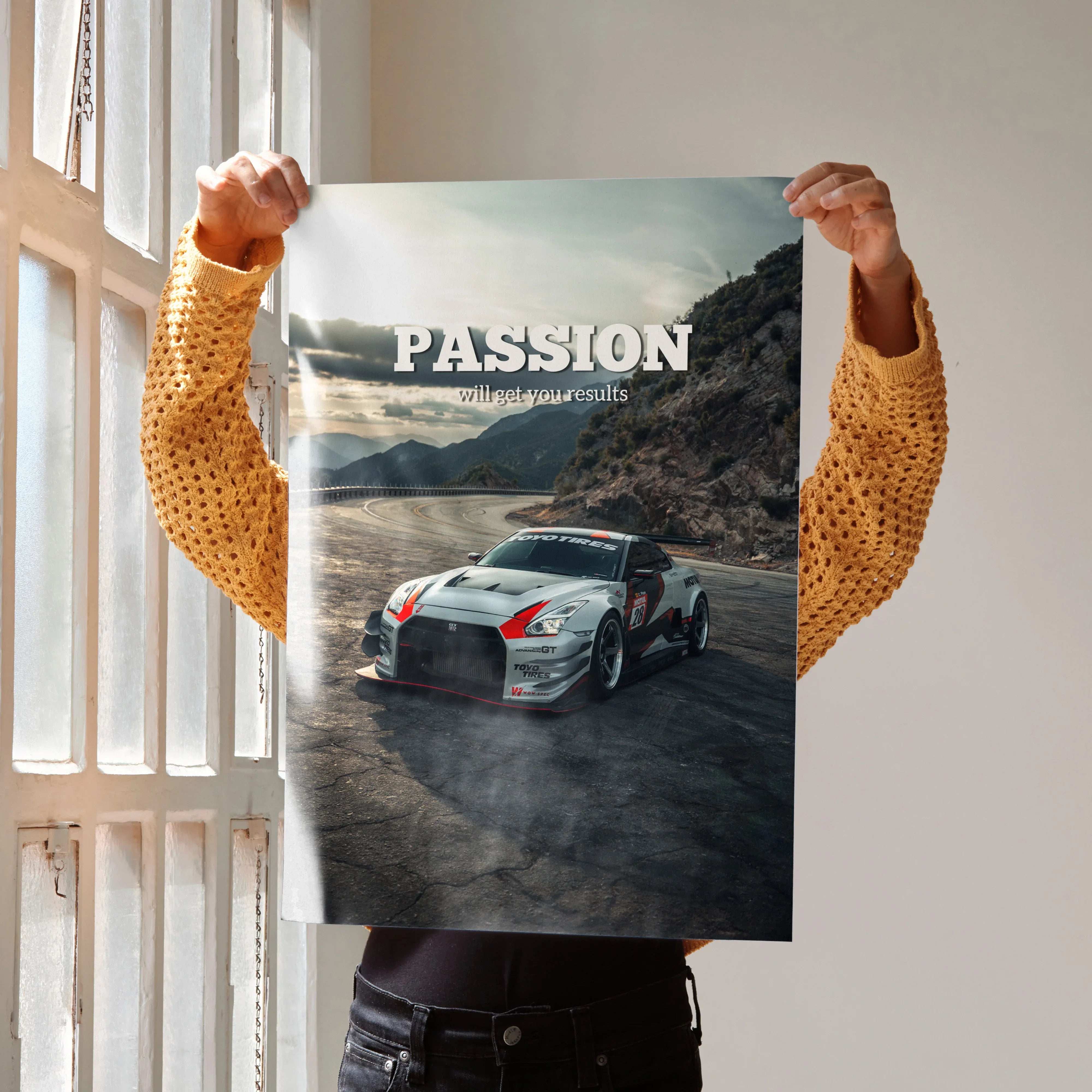 Motivational poster wall art of silver Nissan R35 GT-R on mountain road with text "PASSION".
