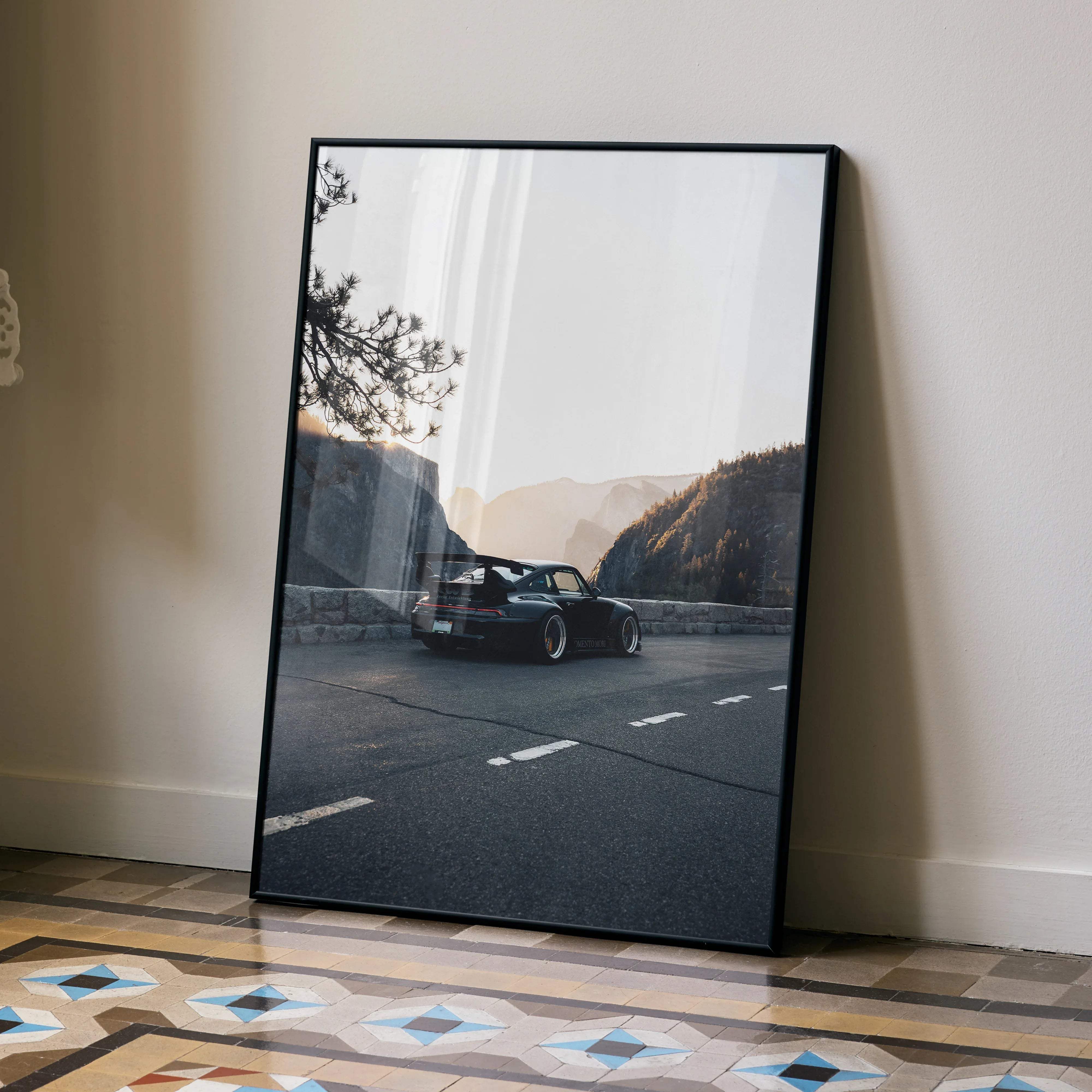 Black framed art print of sleek black porsche 911 on winding mountain road rwb porsche 911 high resolution wall art poster