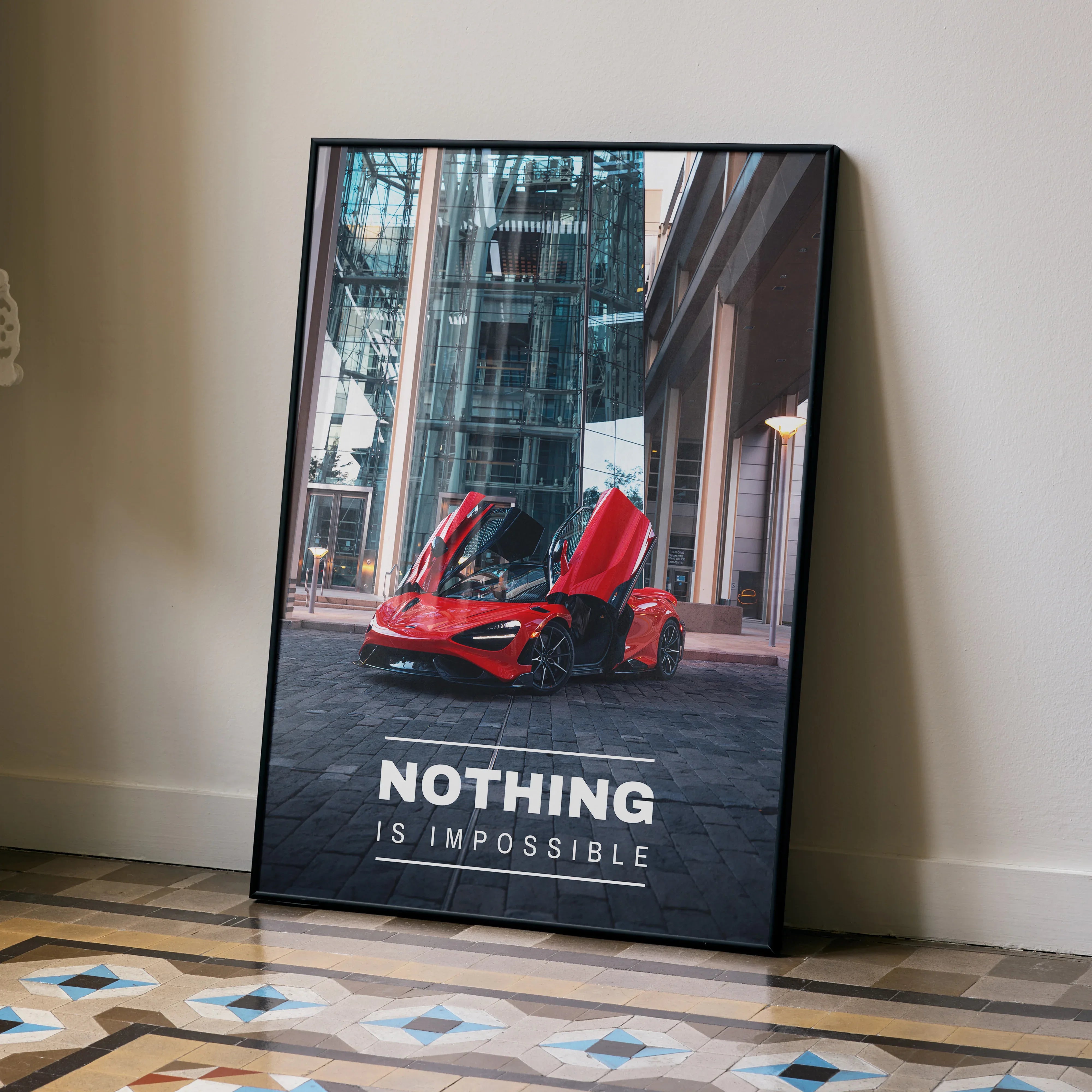Motivational poster wall art featuring red McLaren 765LT with open doors and text "Nothing Is Impossible".
