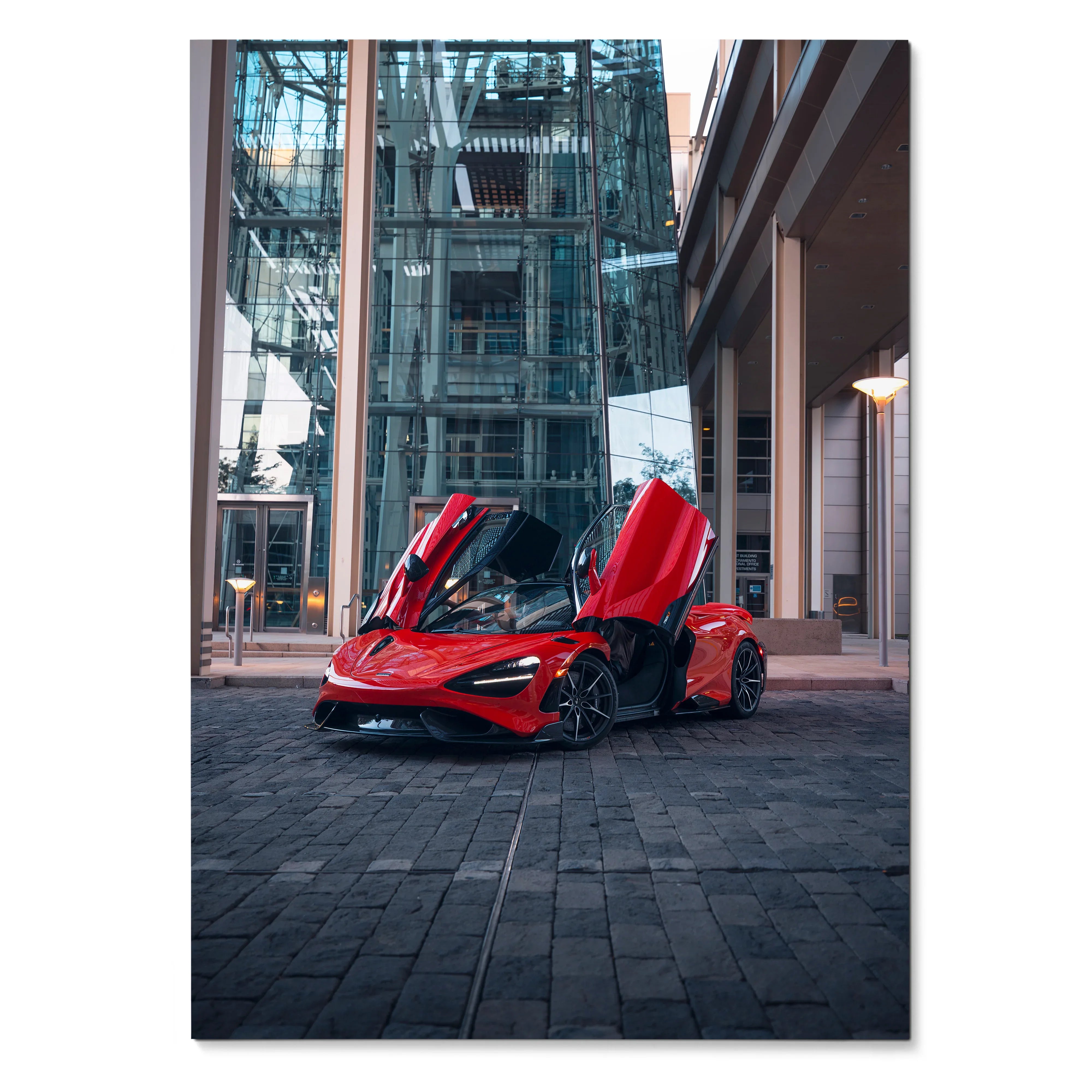 McLaren 765LT supercar with red doors open in front of modern glass building poster wall art.