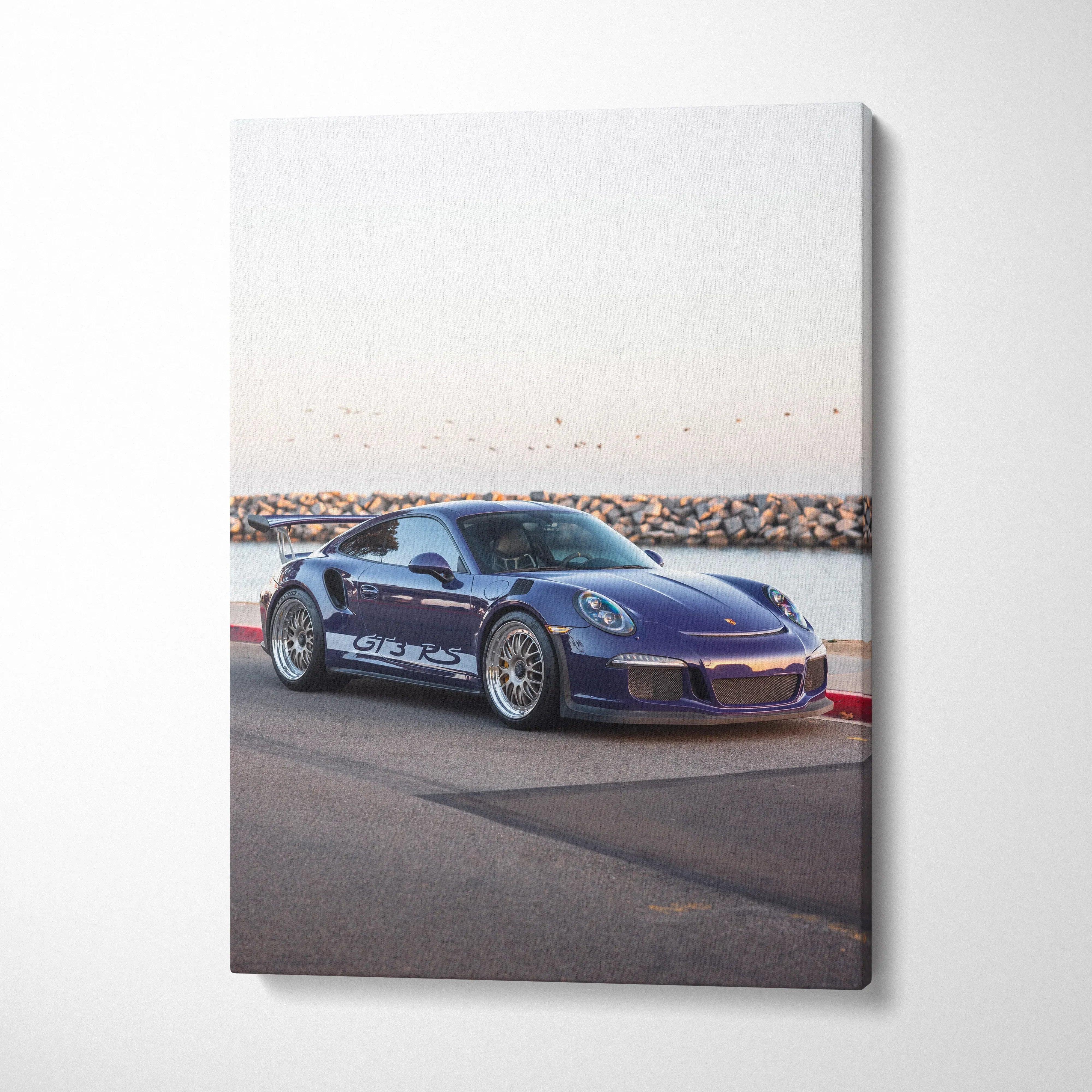 Porsche 911 GT3 RS blue sports car on coastal road canvas wall art vertical print.