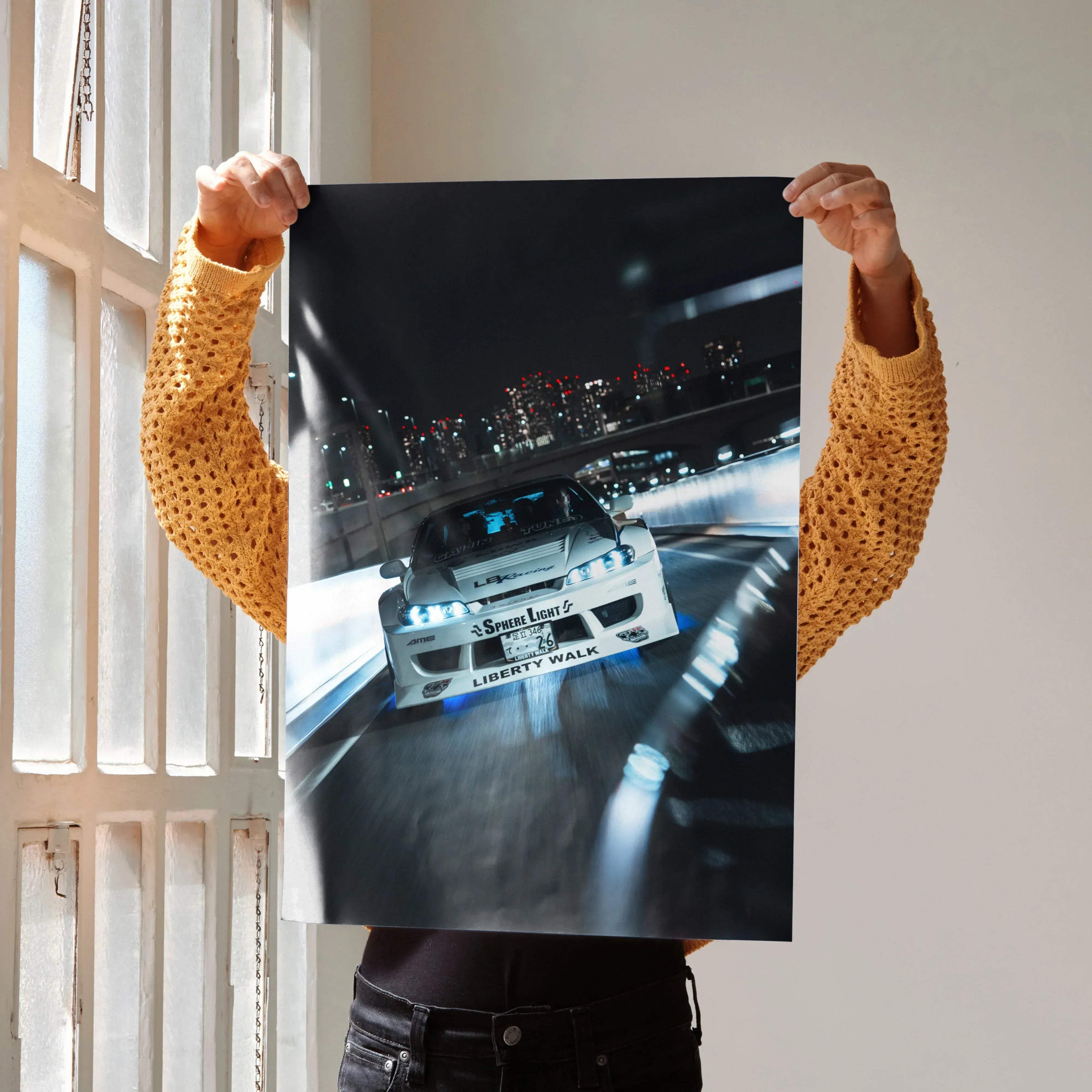 Nissan Silvia S15 white drift car poster with illuminated headlights and nighttime cityscape backdrop high resolution