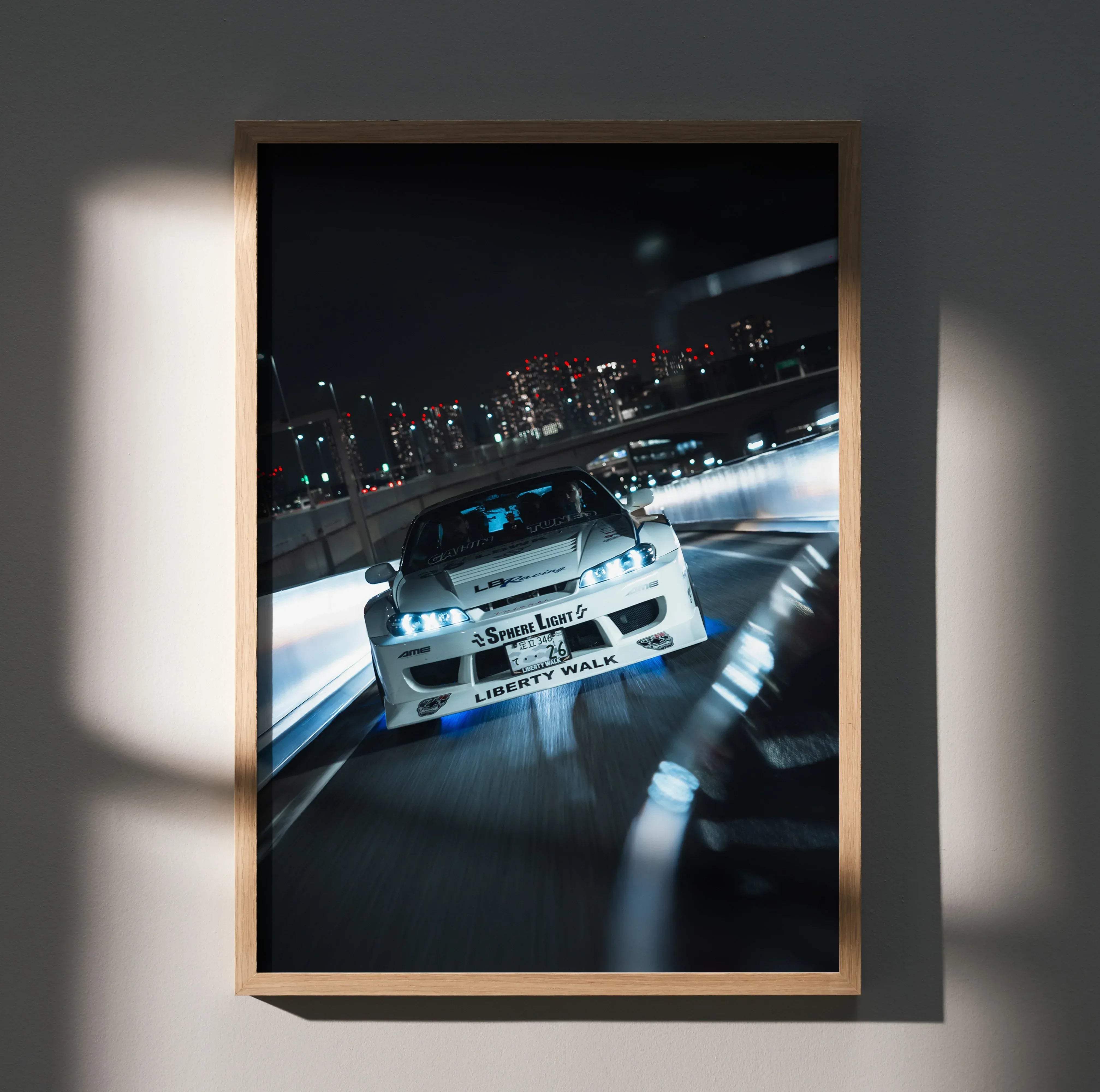 A framed high resolution poster of a white Nissan Silvia S15 drift car with blue underglow and Liberty Walk decals