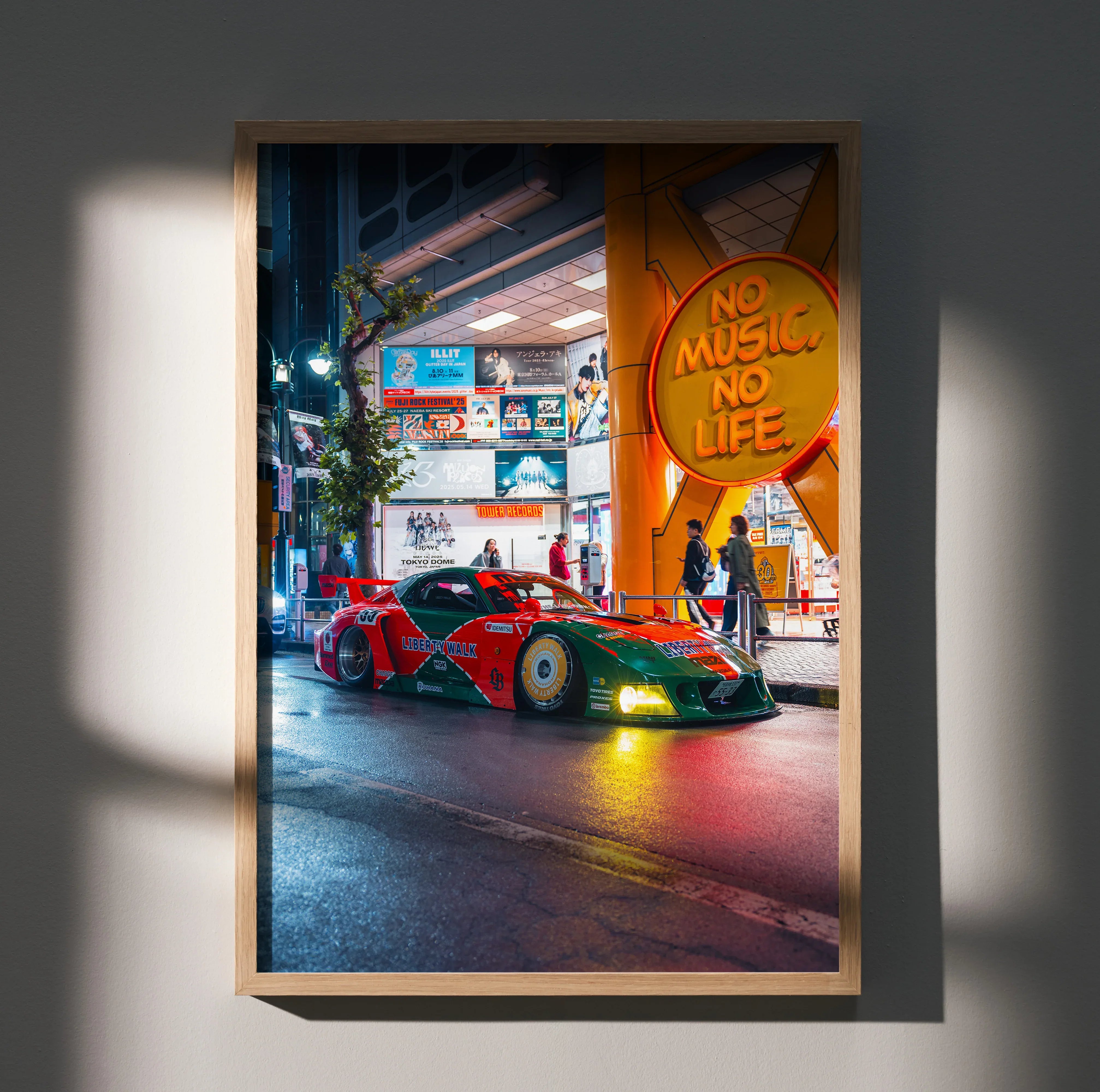 Mazda FD RX7 racing car parked on urban street at night poster wall art with neon signs.