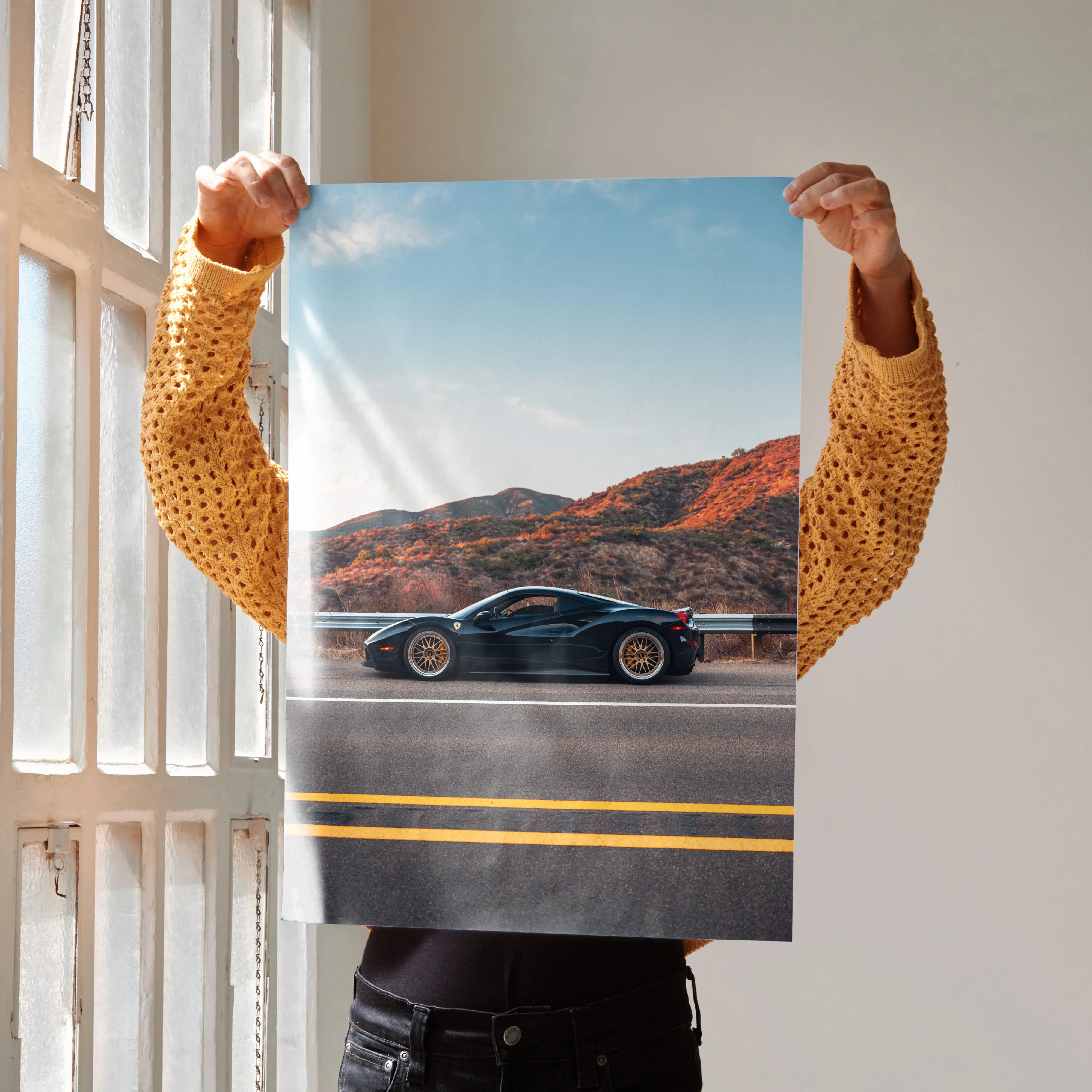 Ferrari 488 GTB supercar poster showing black sports car on desert road with mountains wall art.