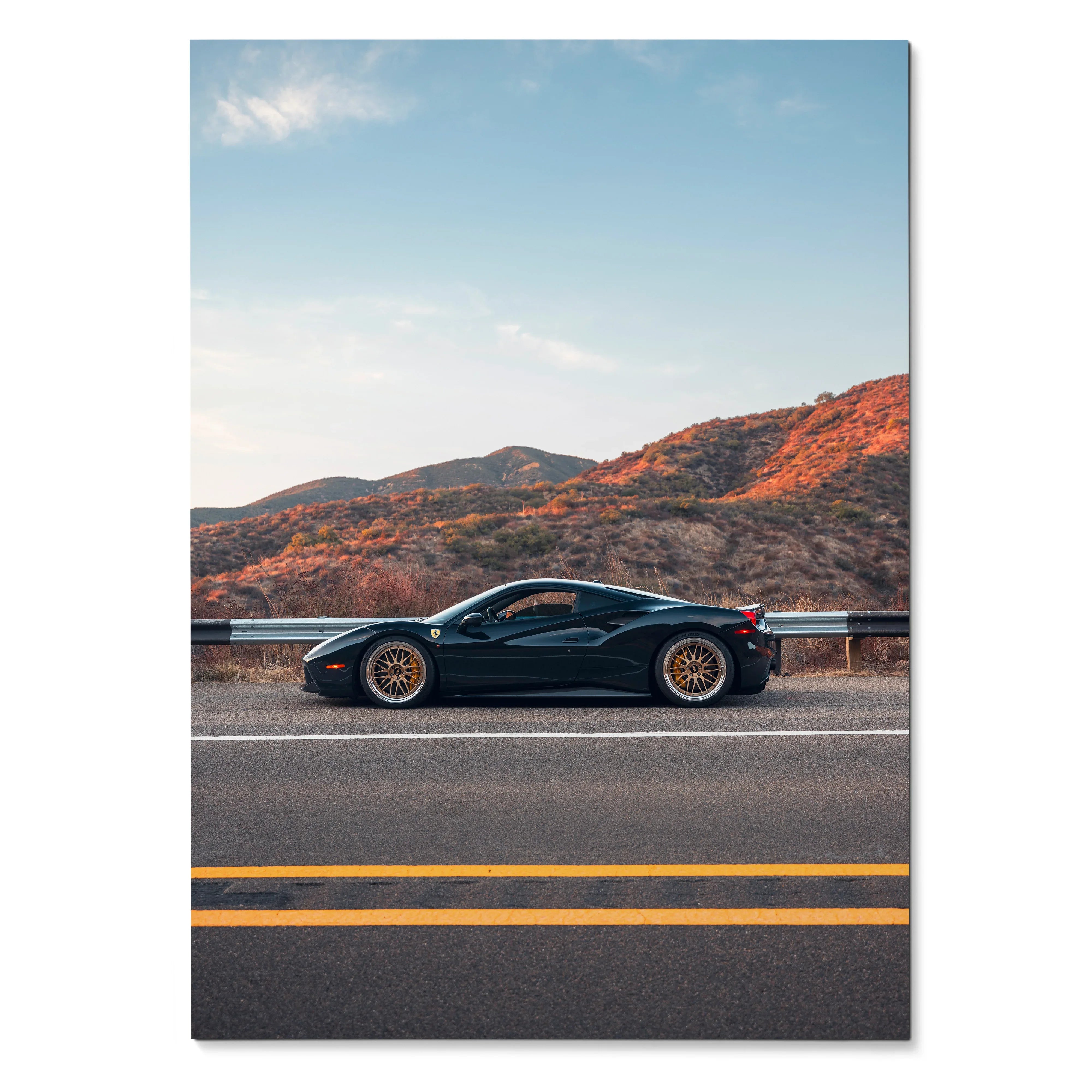 Sleek black Ferrari 488 GTB supercar on highway with mountain background poster wall art.