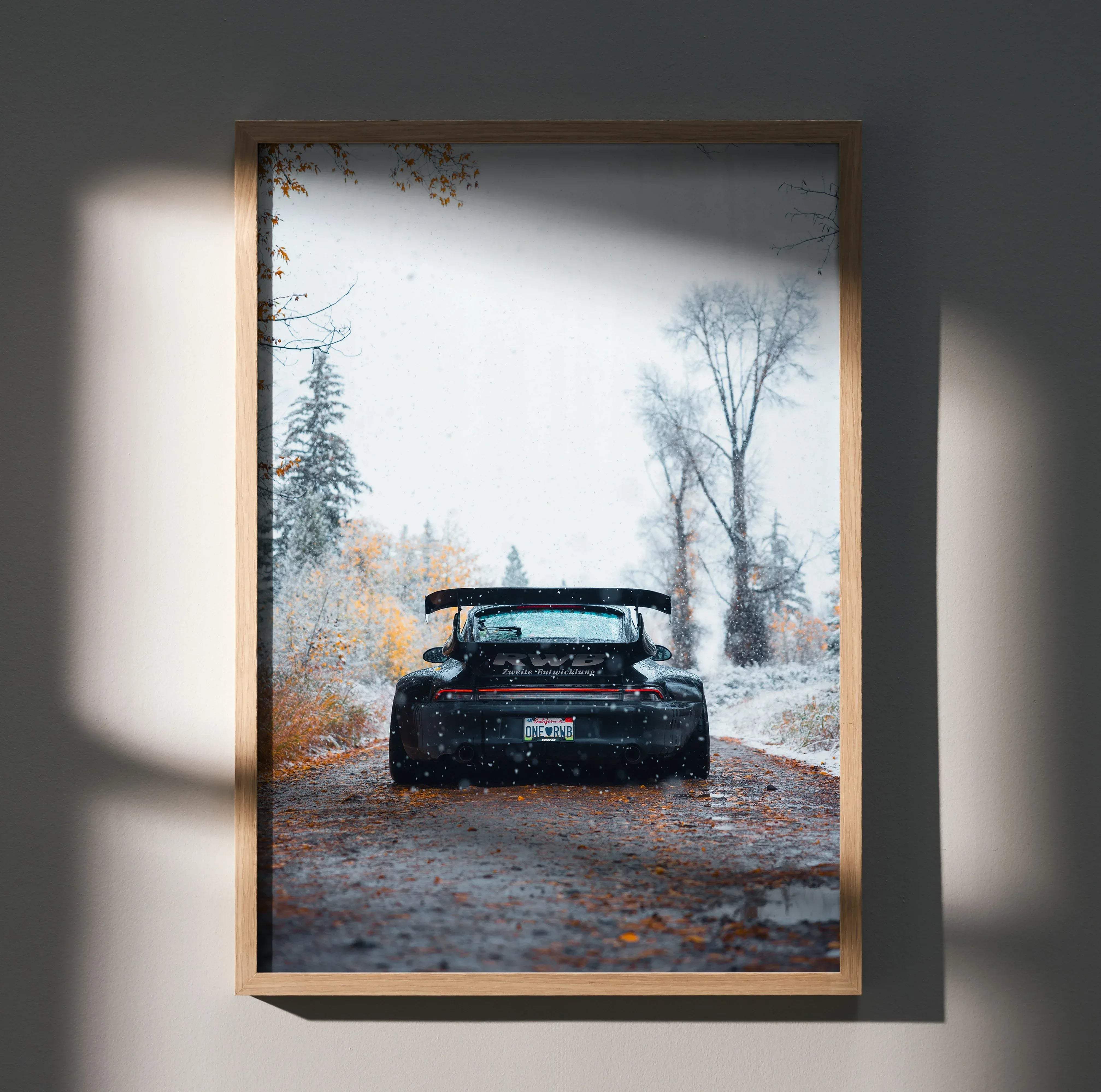 Black porsche 911 gt3 rs sports car with rear spoiler in motion on snowy forest road rwb porsche 911 poster 007