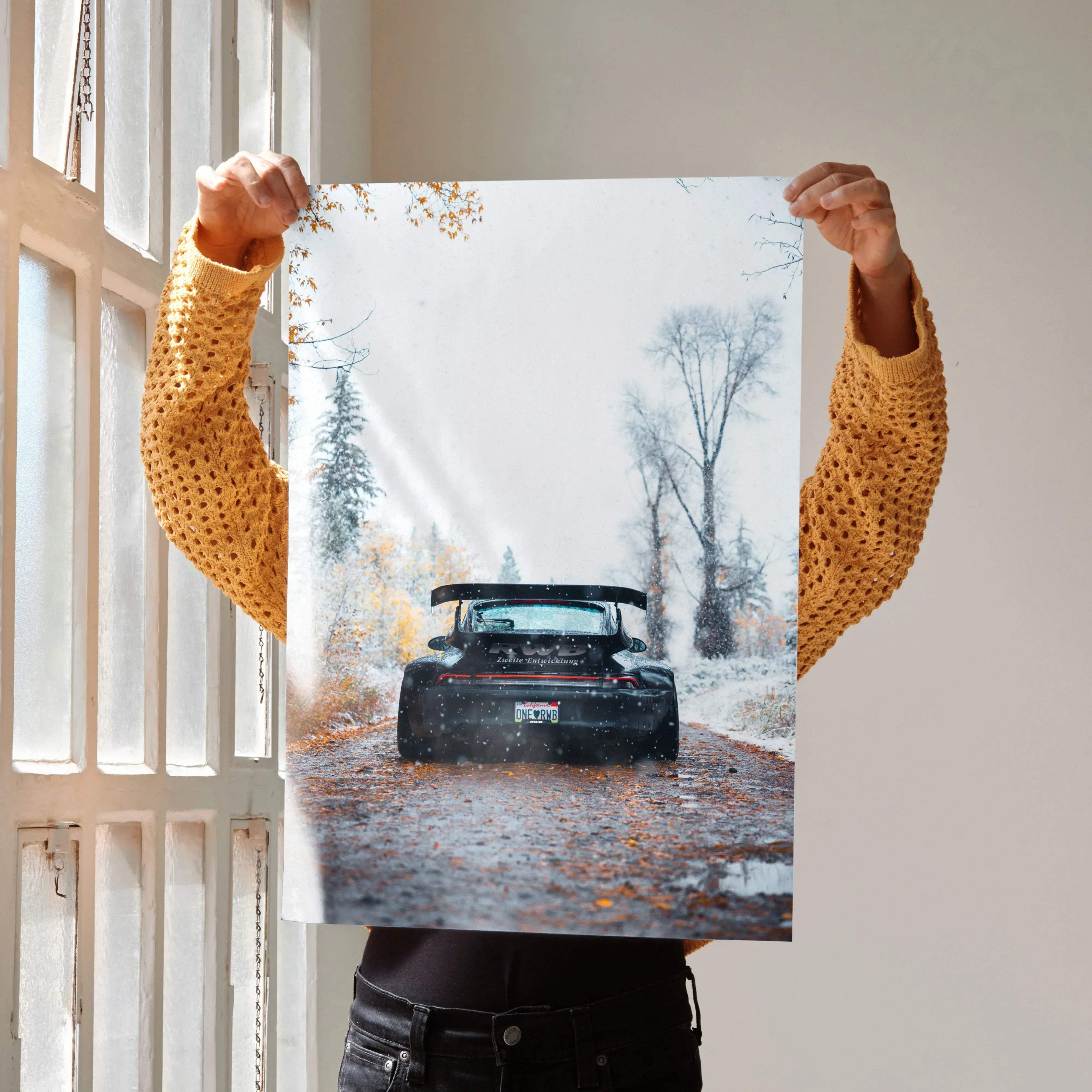 Black porsche 911 sports car poster showing rear view driving through snowy autumn woods rwb porsche 911 #007