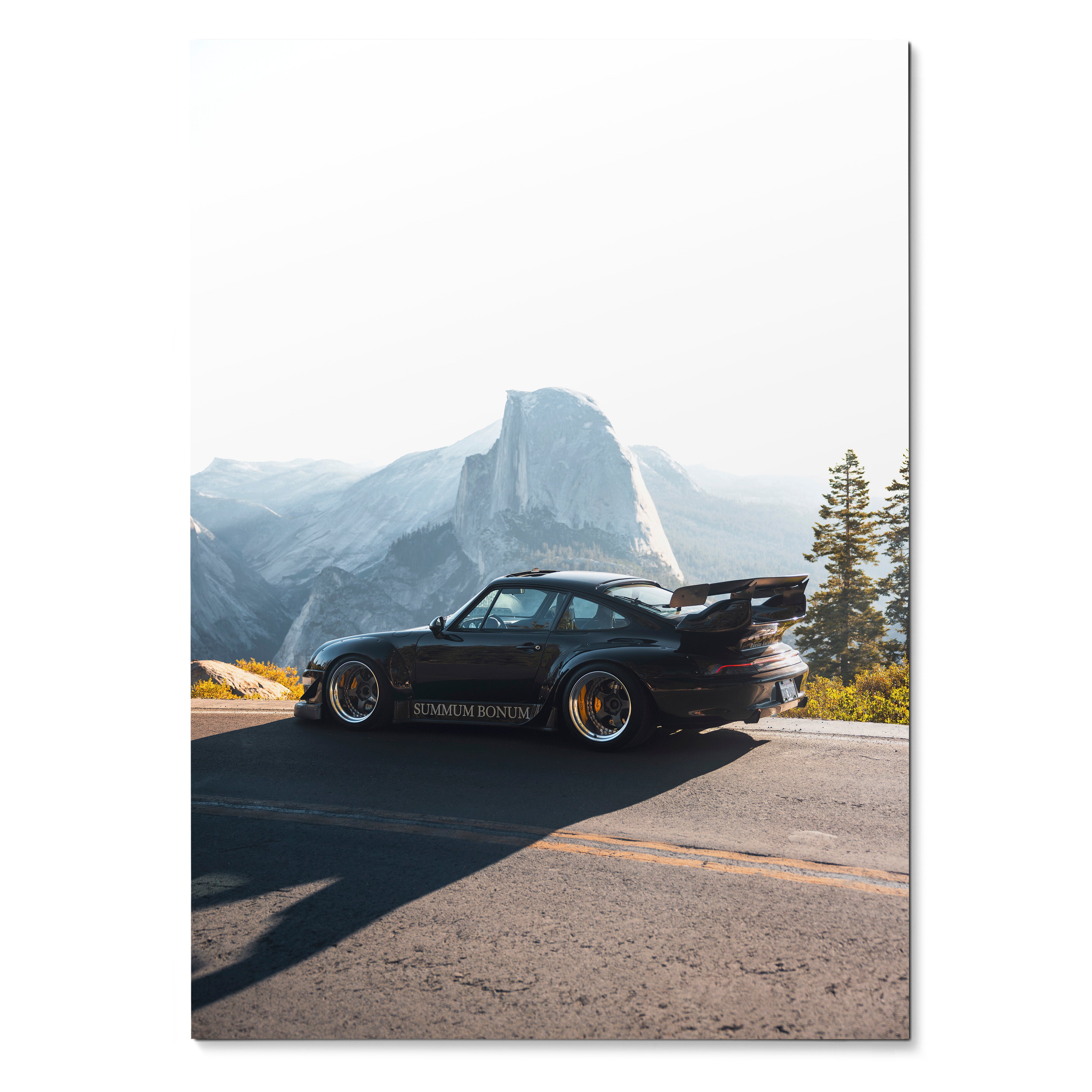 RWB Porsche 911 poster with dark body and wide fenders against mountain landscape wall art.