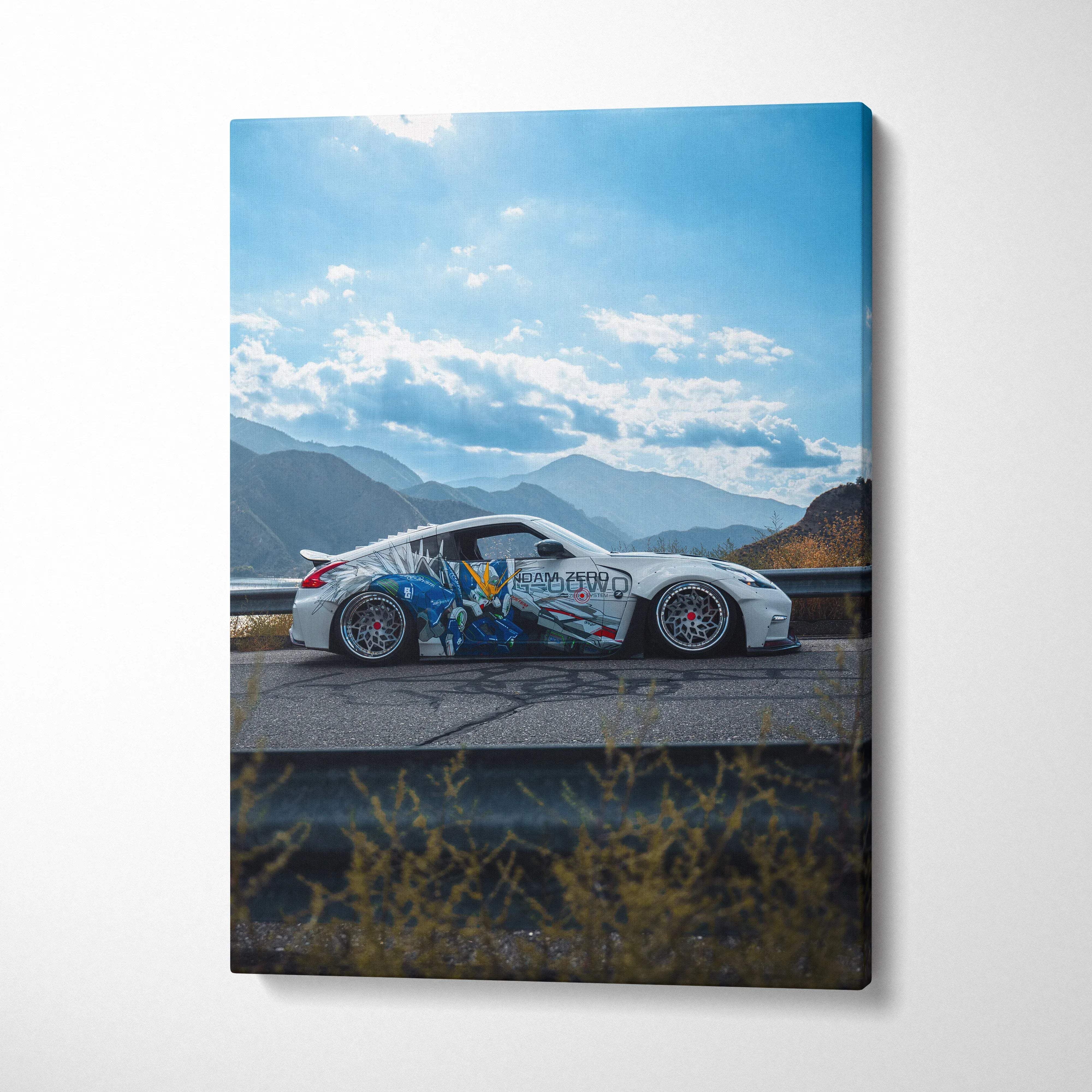 Nissan 370z with vibrant graffiti art design on vertical canvas wall art against mountain backdrop.
