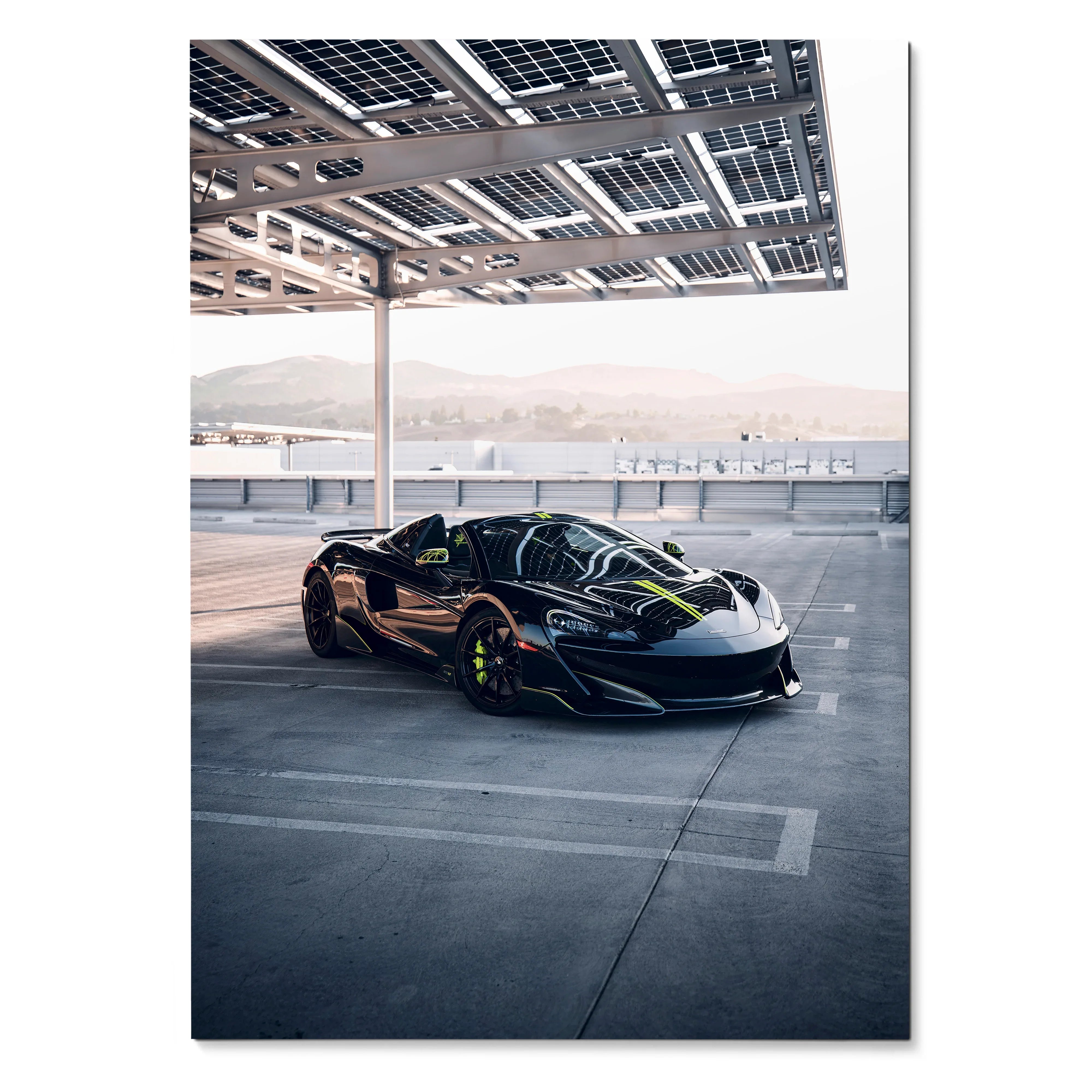 McLaren 600LT black supercar under modern metal canopy poster wall art with city background.