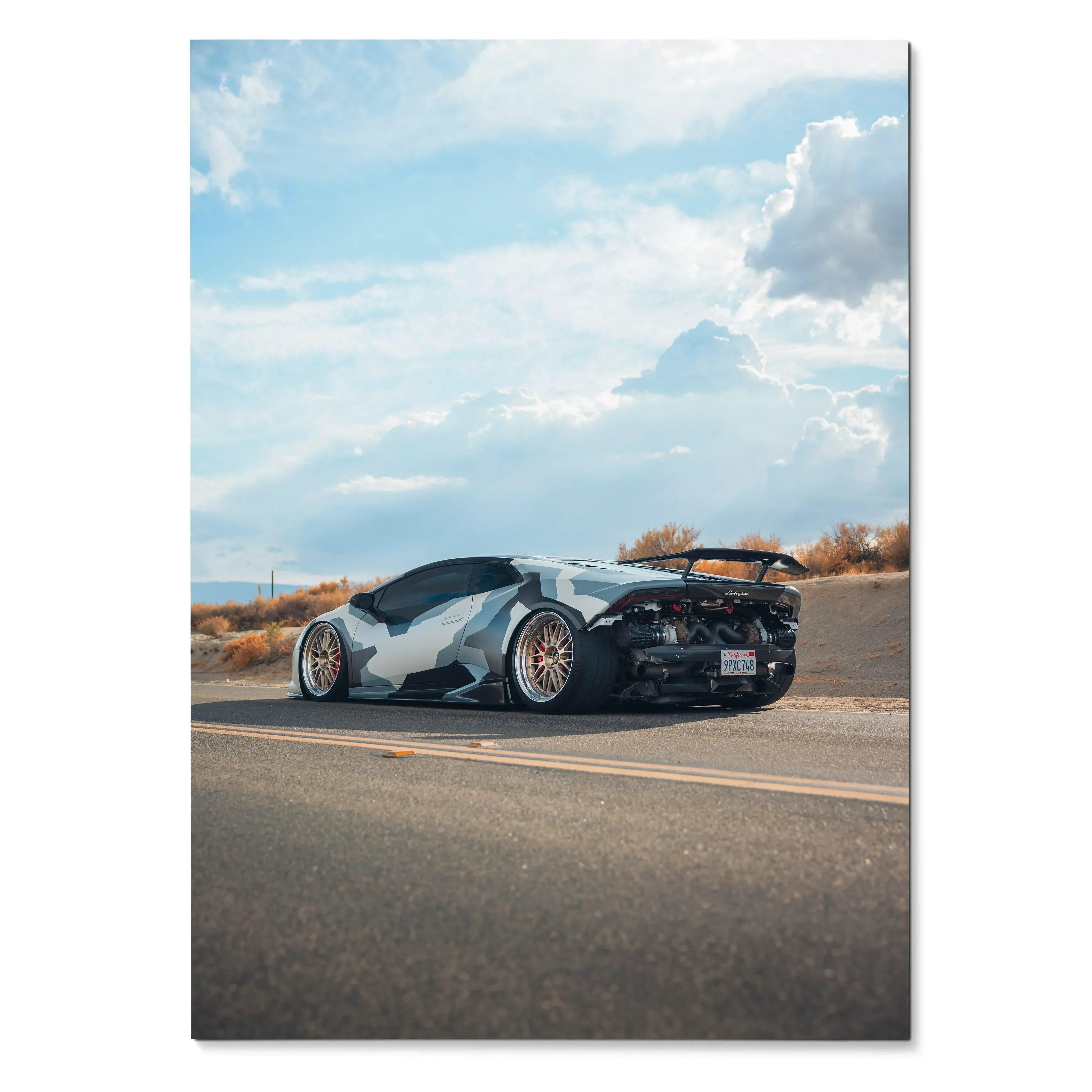 Lamborghini Huracan black and white sports car on road against blue sky poster wall art.
