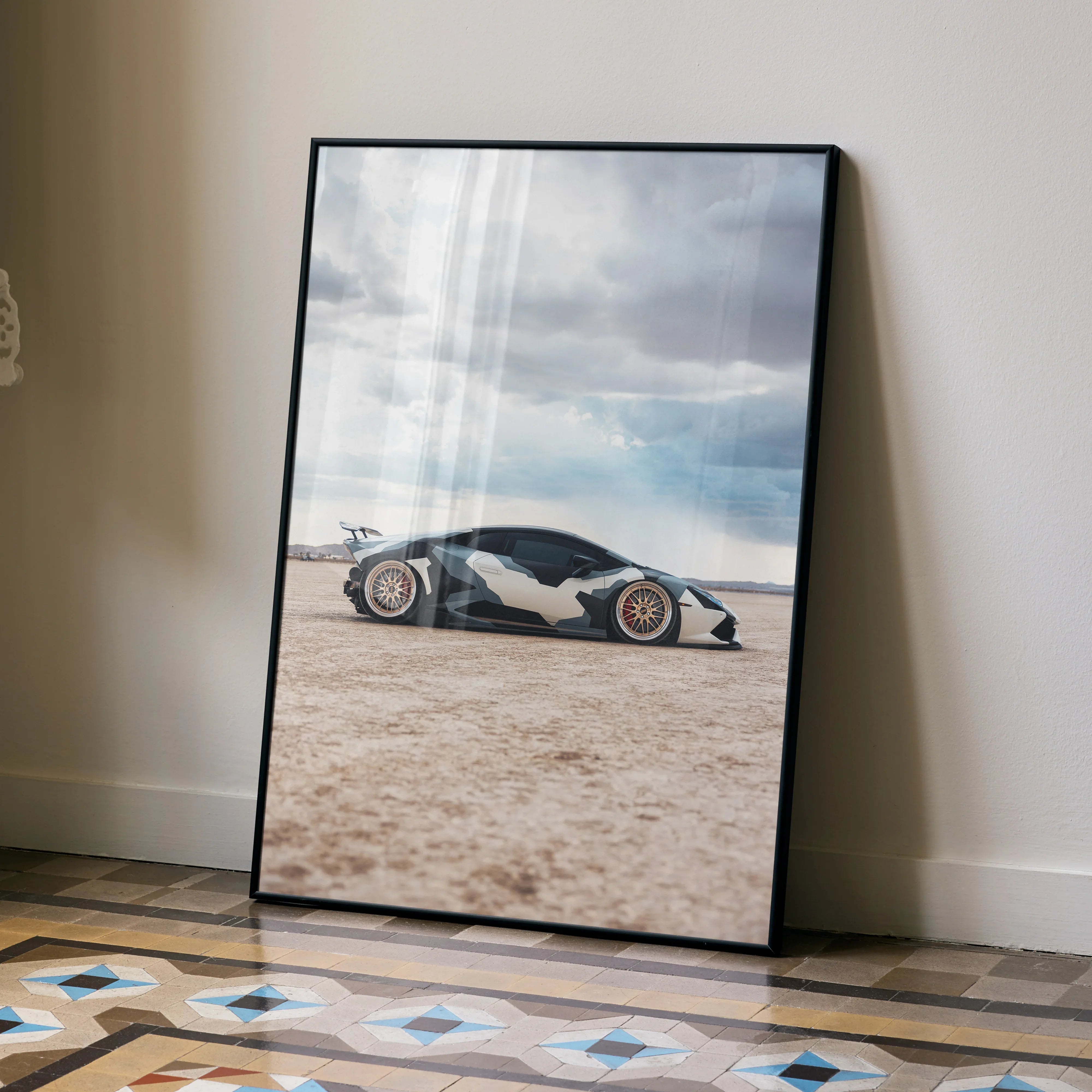 Lamborghini Huracan black and white sports car on desert road wall art poster in black frame.