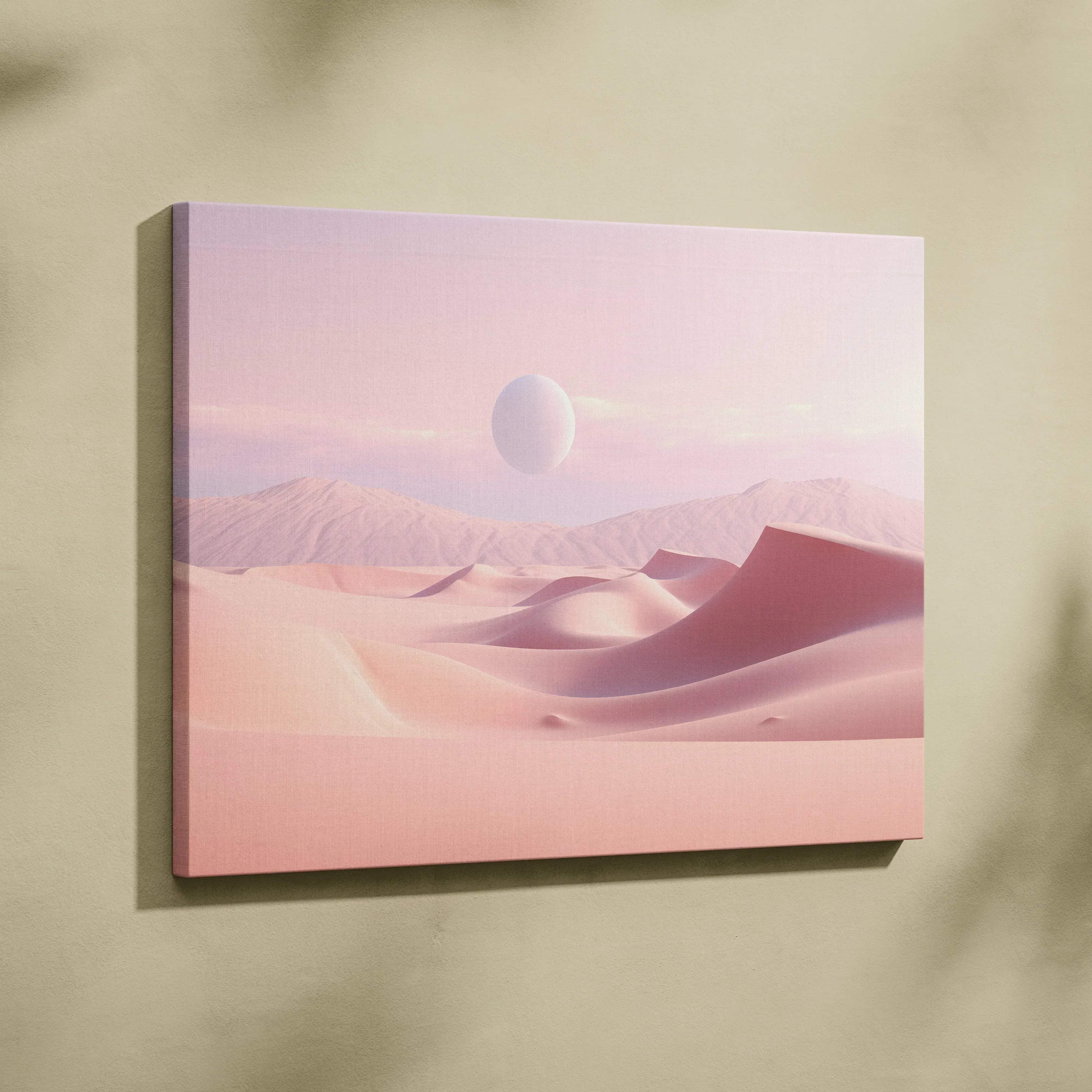 A soft pink canvas wall art featuring a minimalist surreal desert landscape with rolling dunes and a floating orb