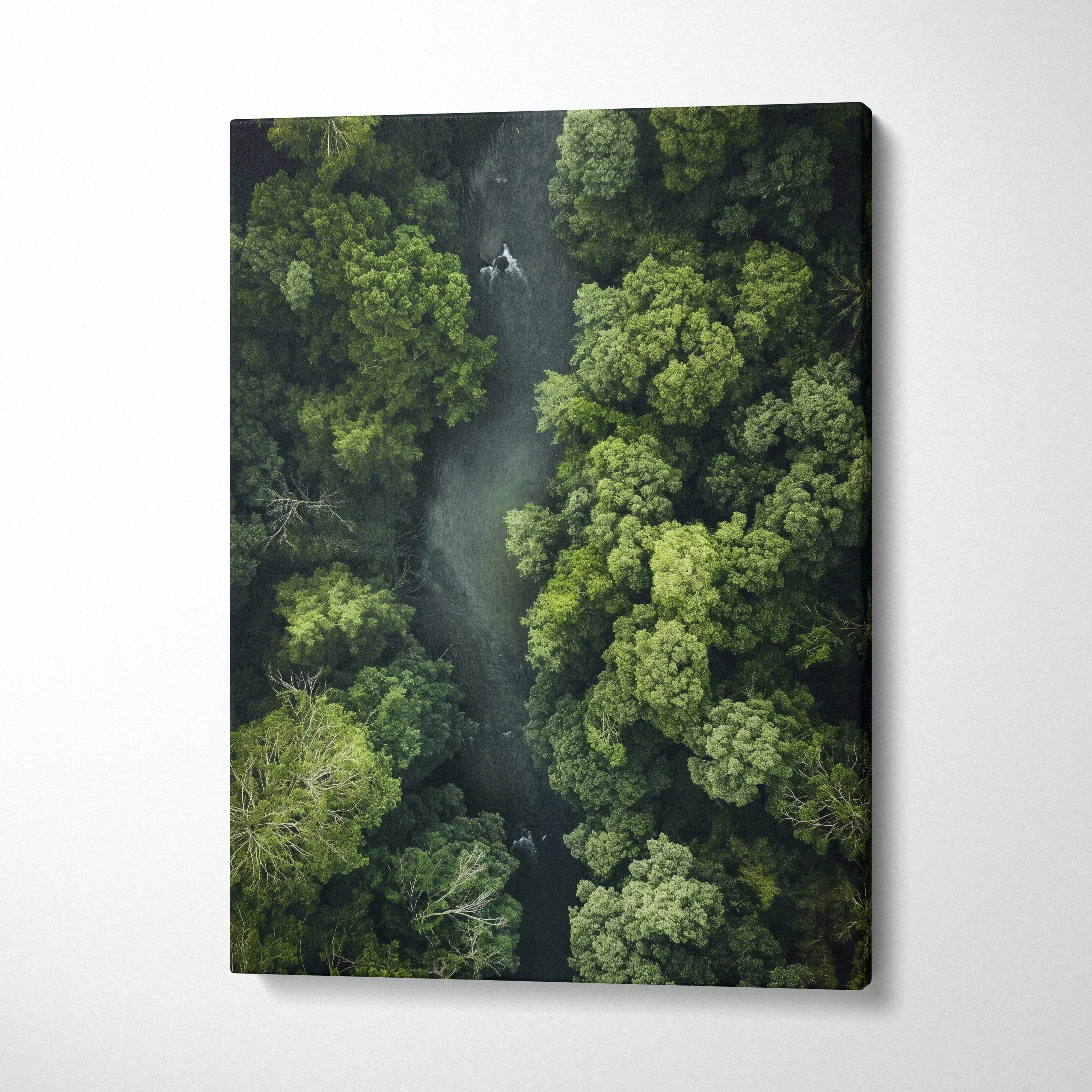 Canvas wall art featuring a serene river winding through a dense forest of towering green trees, nature decor.
